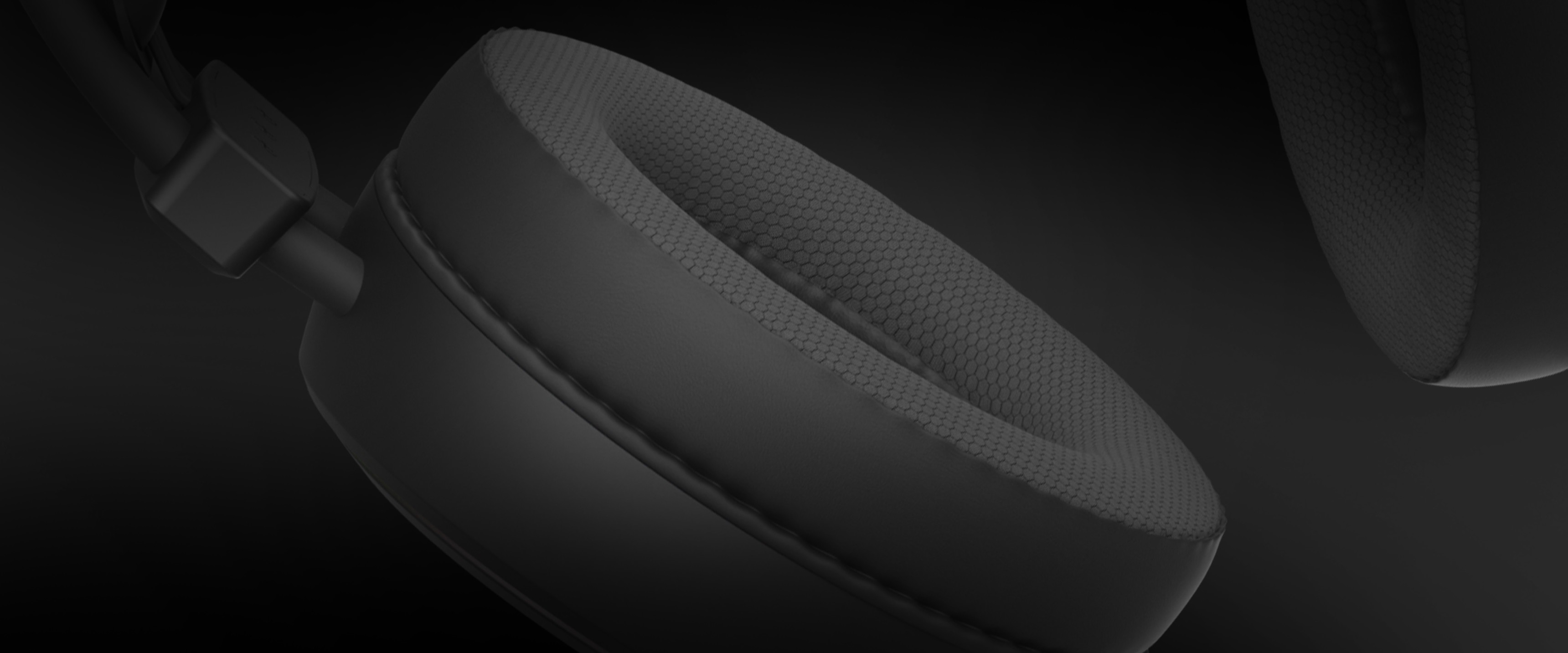 Black Genesis Neon 613 G2 RGB over-ear headphones with a microphone and illuminated accents, showcasing textured ear cushions