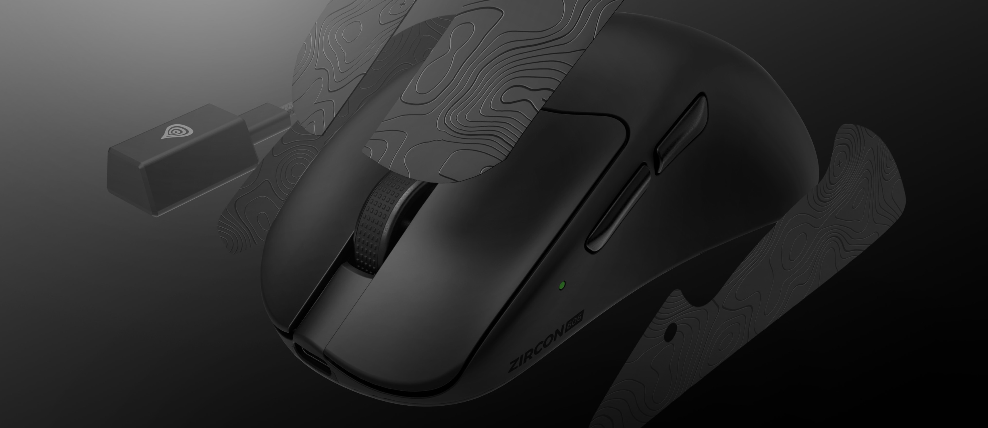 Gaming mouse with detachable grips and a connection cable for charging.