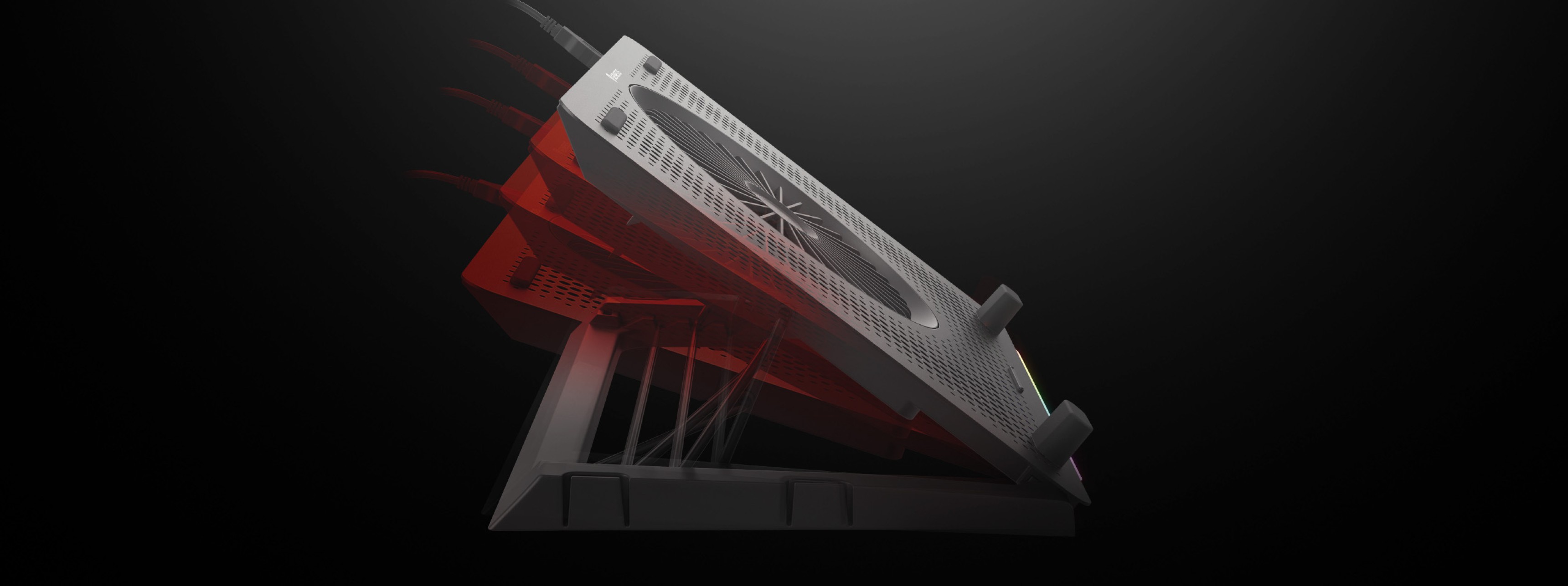 Laptop cooling pad Genesis Oxid 450 RGB with fan, adjustable tilt, and two USB ports, shown against a dark background