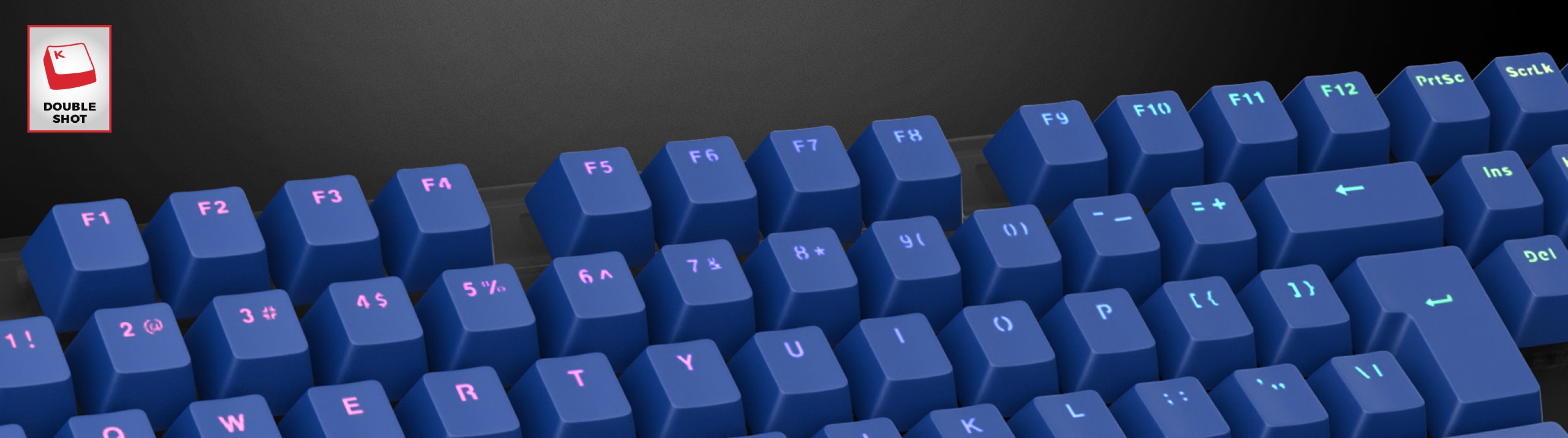 Blue double shot keycaps featuring illuminated letters, designed for a mechanical keyboard. Stylish and durable for gamers