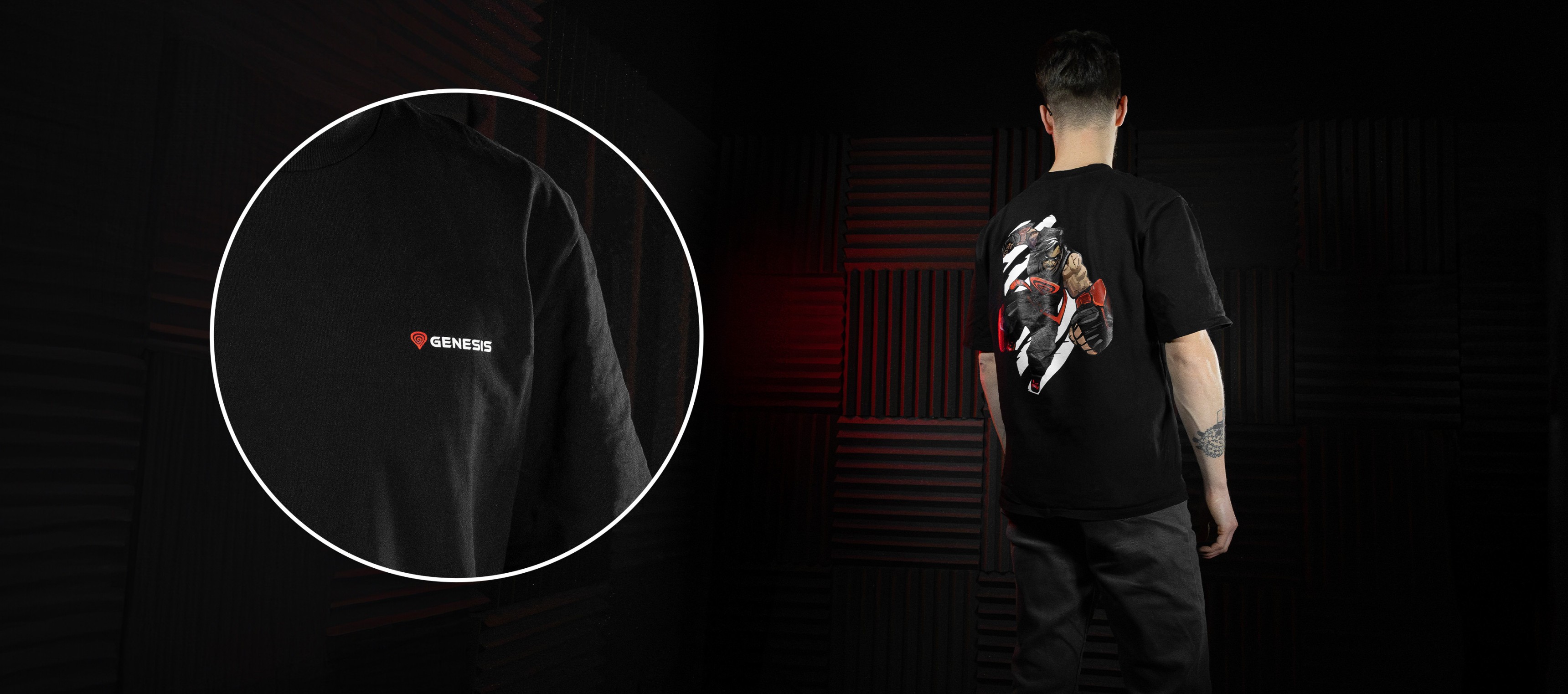 Black t-shirt featuring a colorful graphic on the back and a small logo on the sleeve.