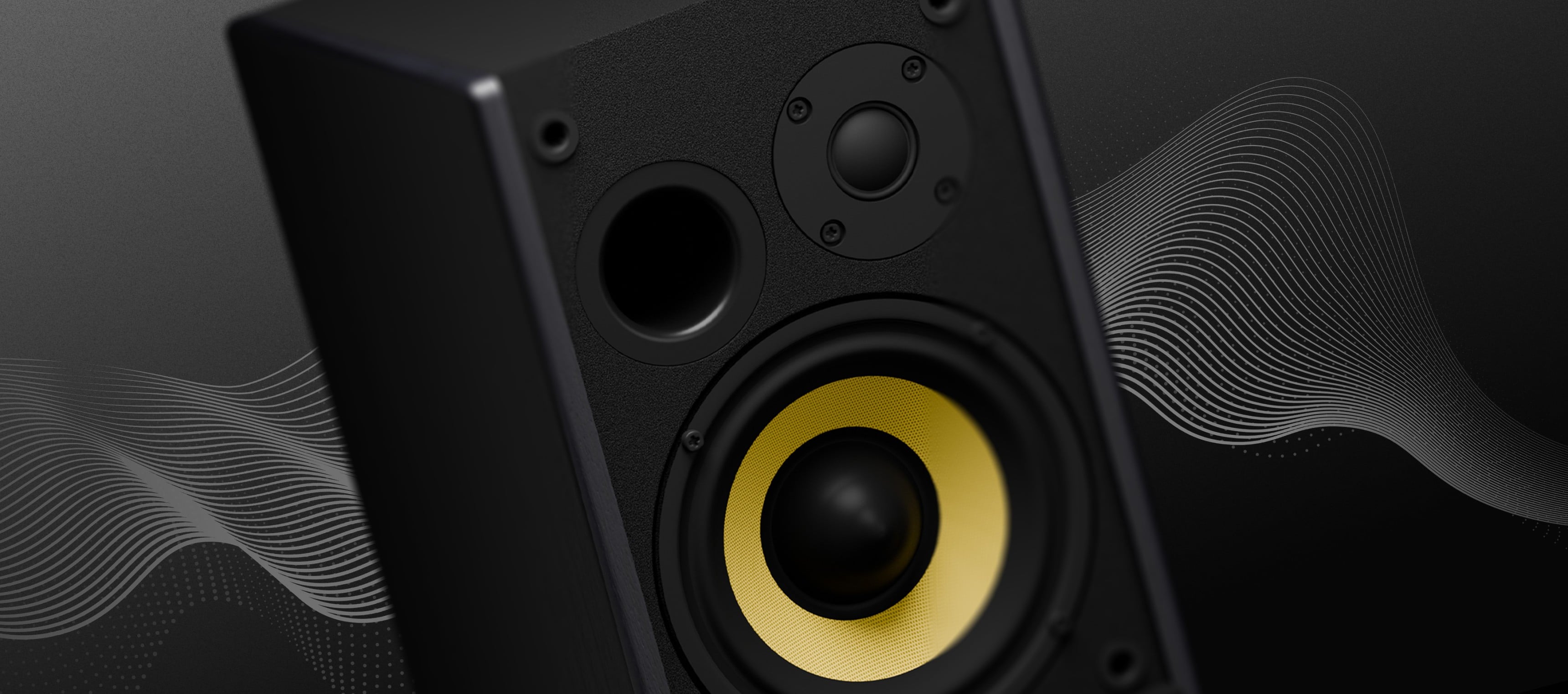 Black speaker with a yellow bass driver and a small tweeter against a dark background.