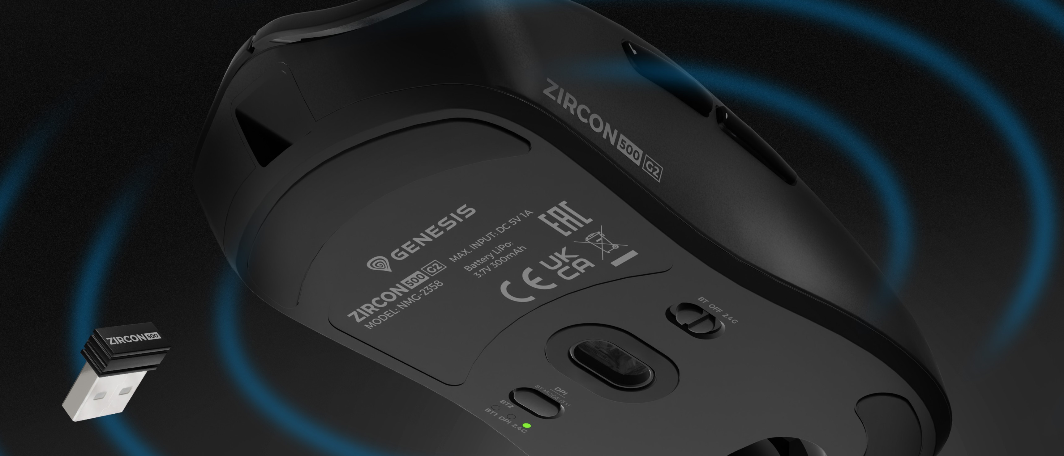 A wireless mouse with a sleek design and a small connection adapter nearby.