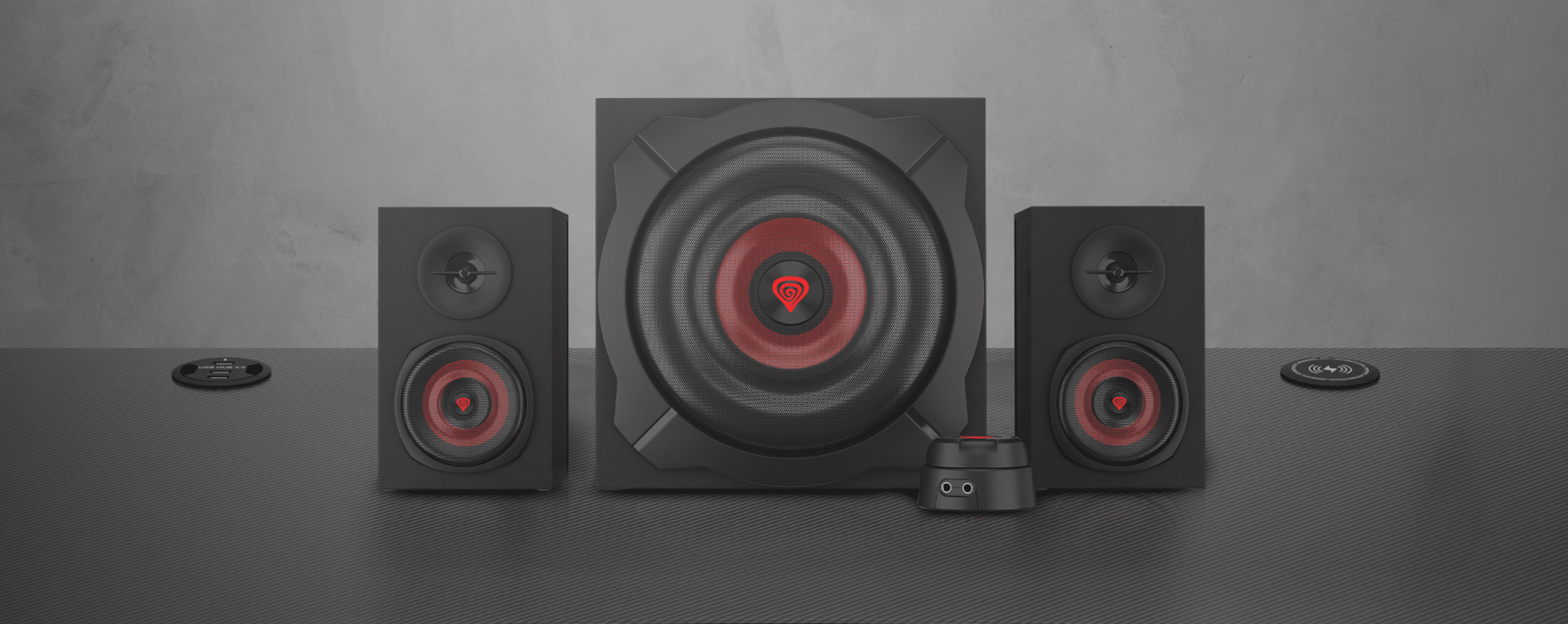 Black Genesis Helium 610BT 2.1 speaker system with a subwoofer and two satellite speakers, featuring a wired remote control