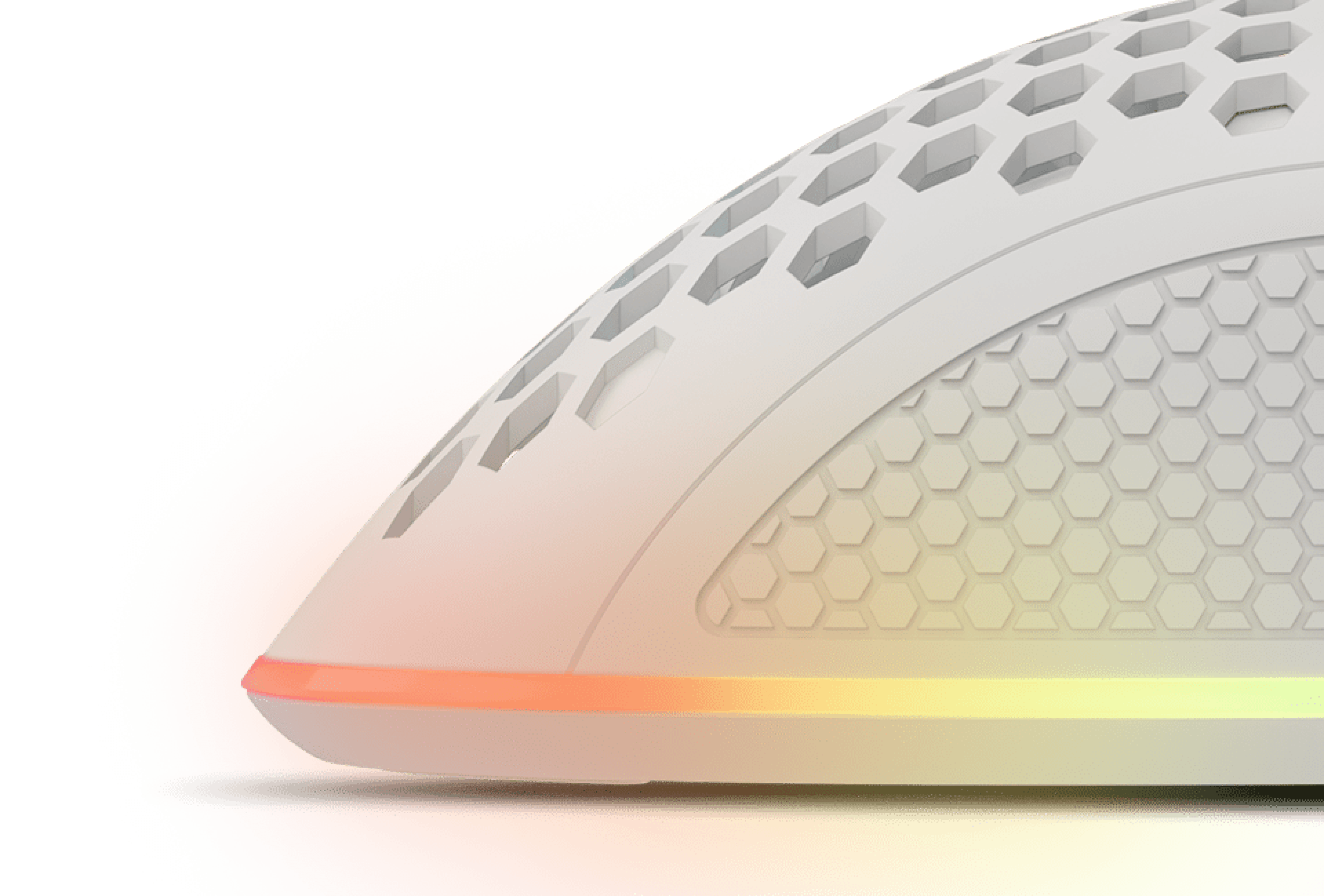White gaming mouse with adjustable 8000 DPI, featuring RGB lighting and a honeycomb design for ventilation and grip