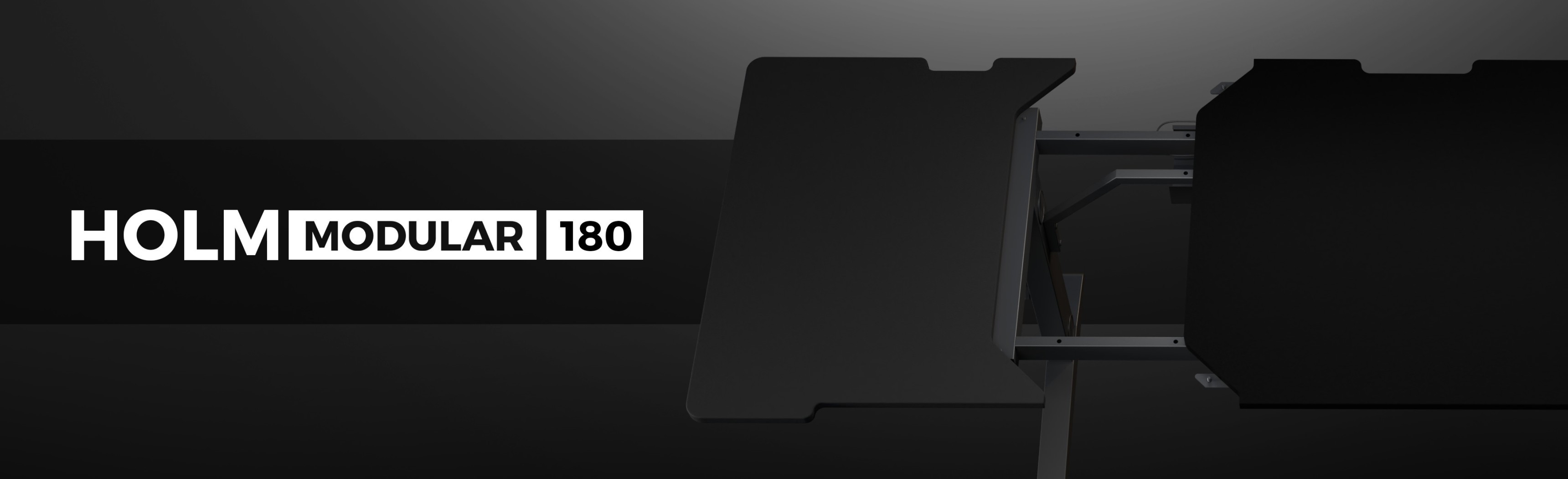 Black modular gaming desk with "HOLM MODULAR 180" branding, featuring a sleek and modern design