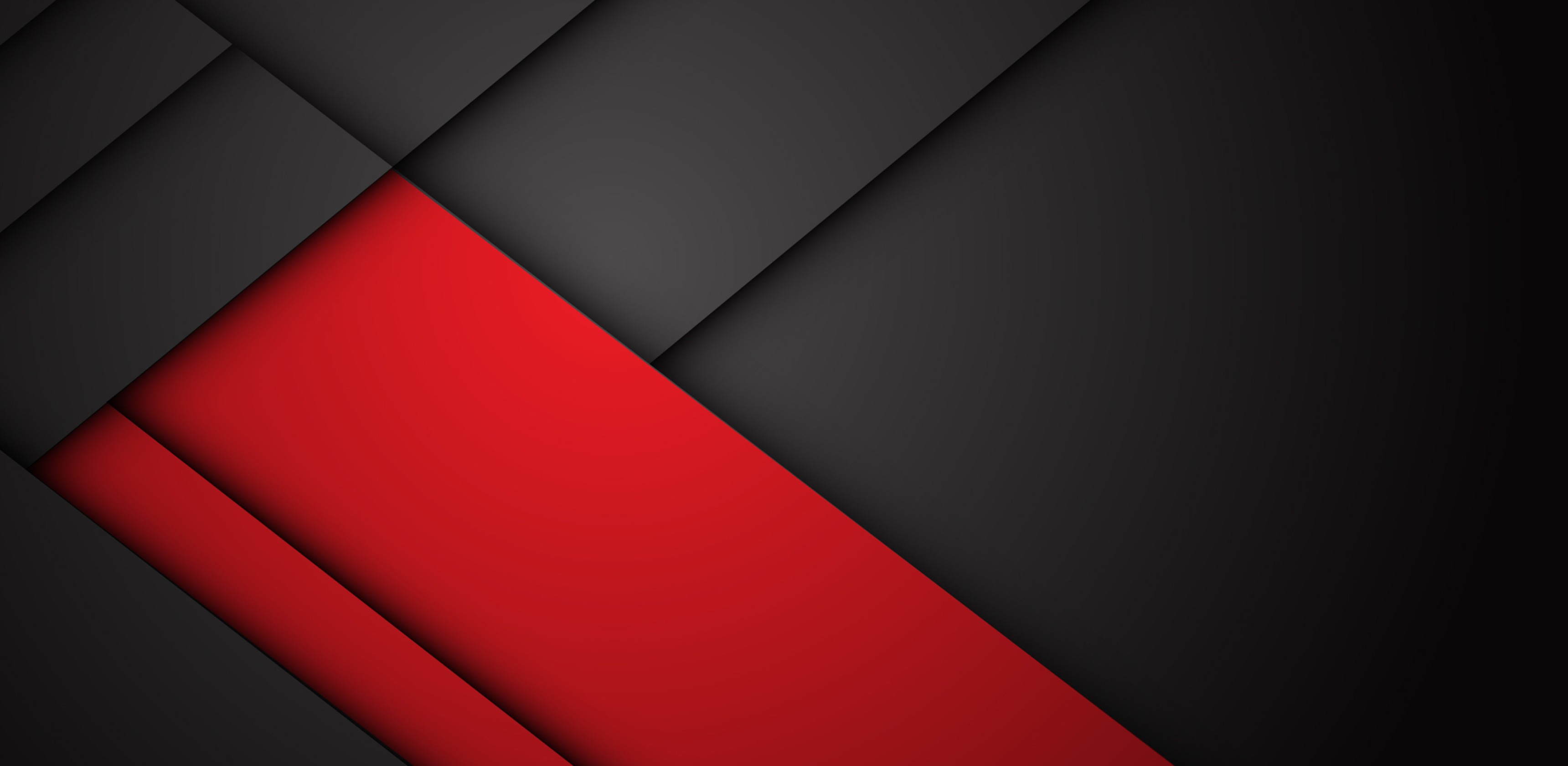 Background featuring layered black and red geometric shapes.
