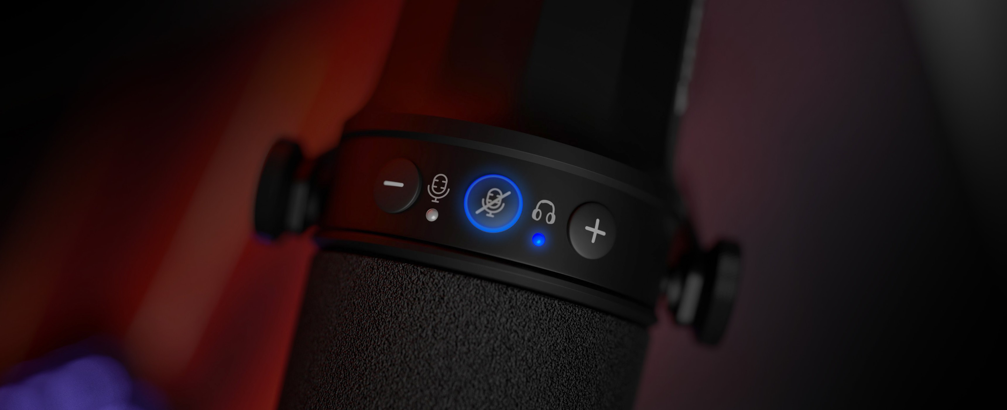 Control panel of a microphone featuring volume buttons and a lighting indicator