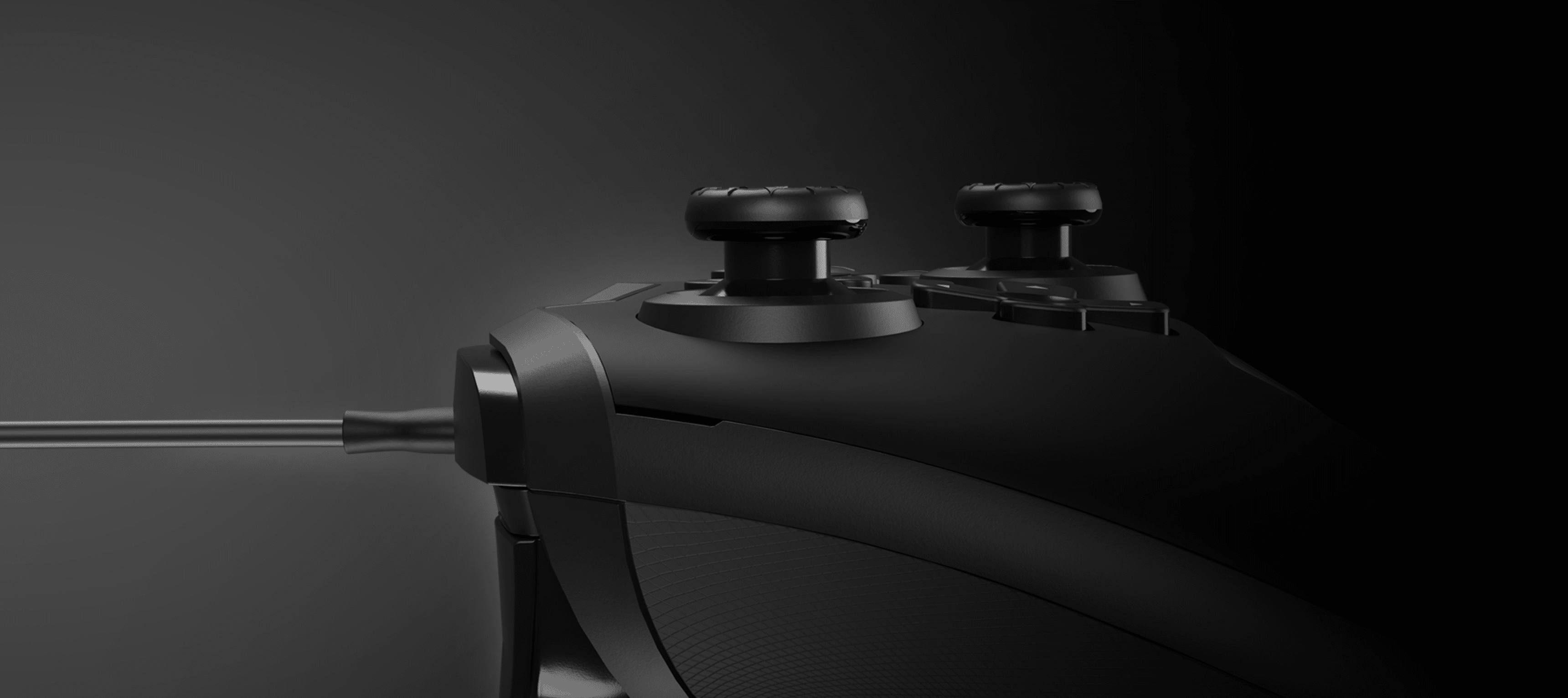 Wired Genesis Mangan 300 gamepad for PC, Switch, and mobile, featuring two analog sticks and a sleek black design