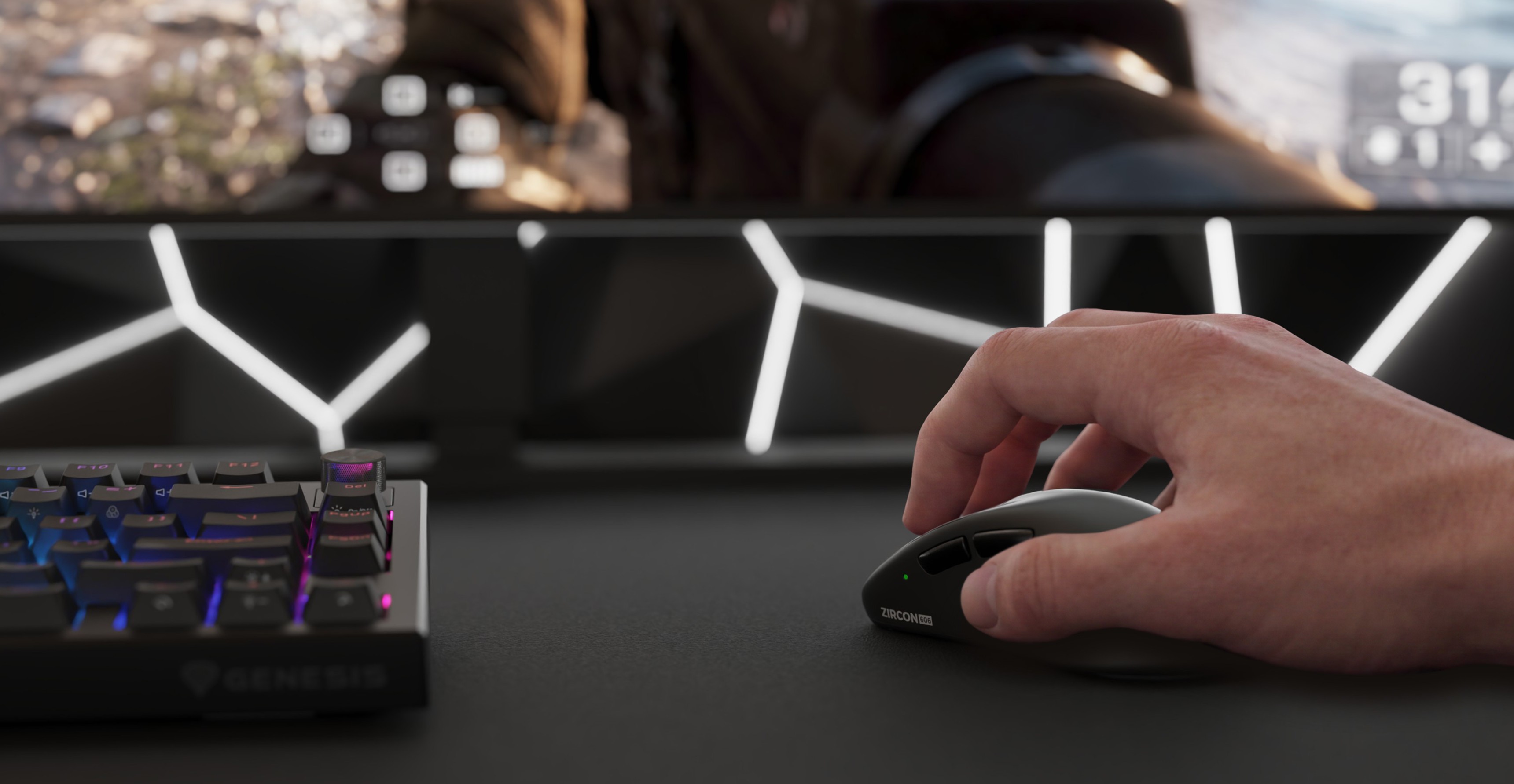 A hand using a gaming mouse near a keyboard and a computer monitor showing a game.