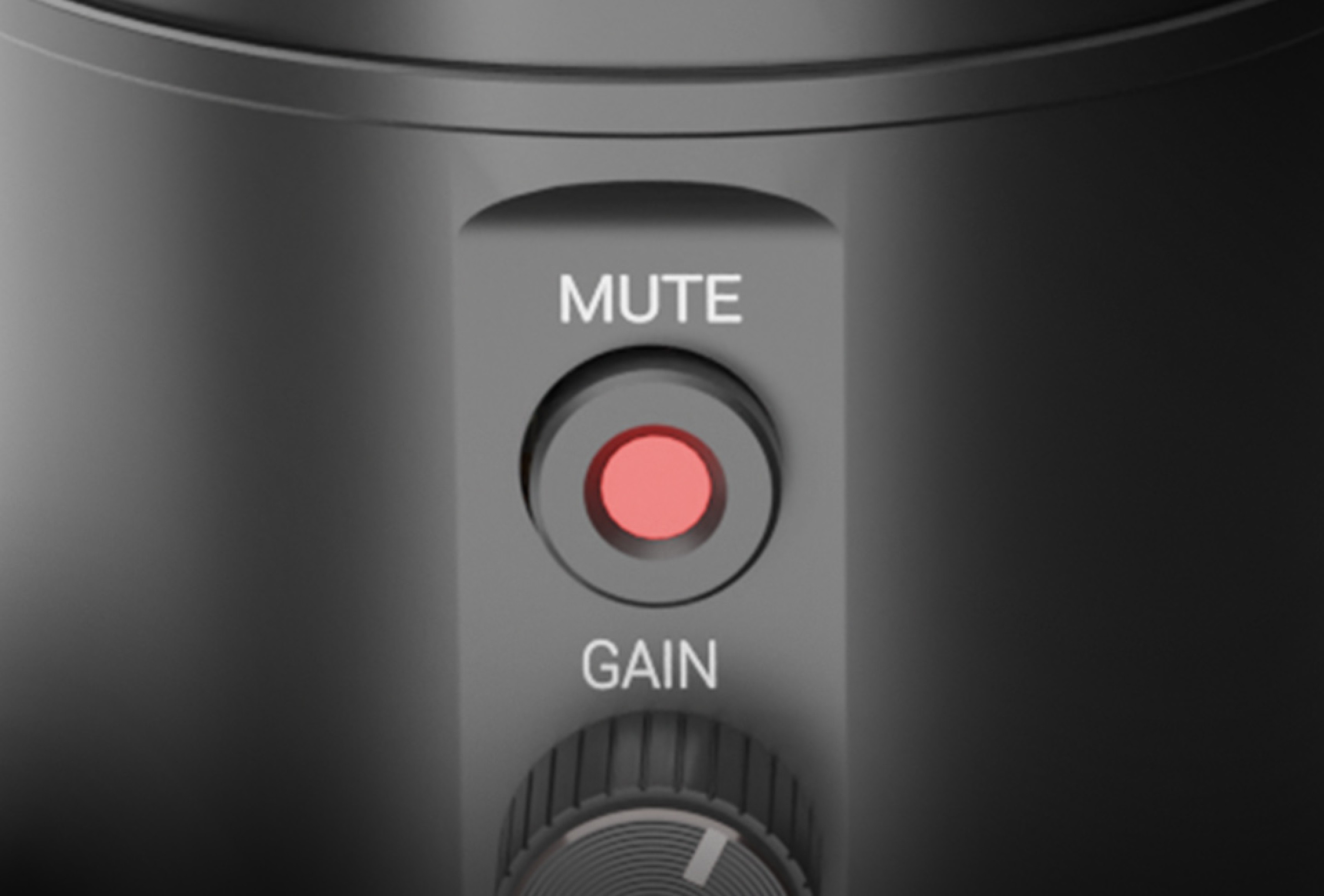 Close-up of the Genesis Radium 600 G2 USB microphone showing the mute and gain controls
