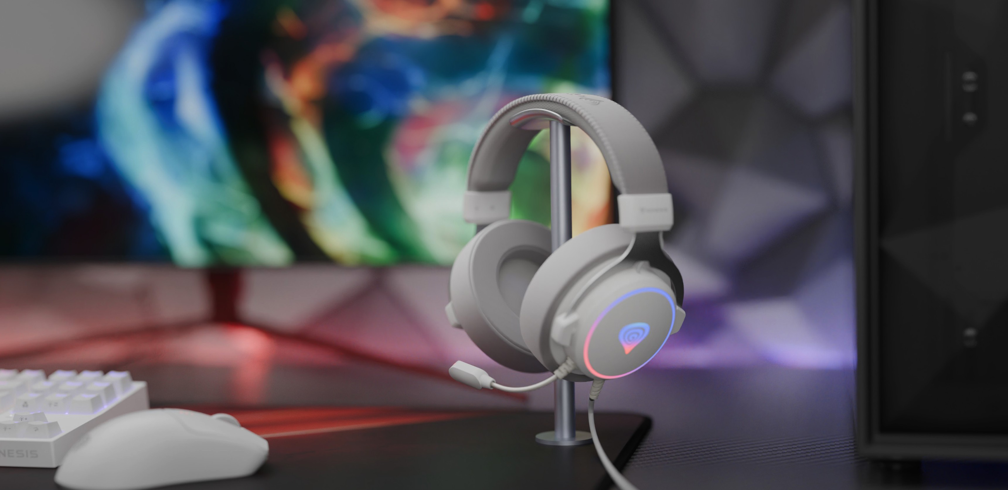 White over-ear gaming headset with RGB lighting and a microphone, displayed on a stand against a colorful background