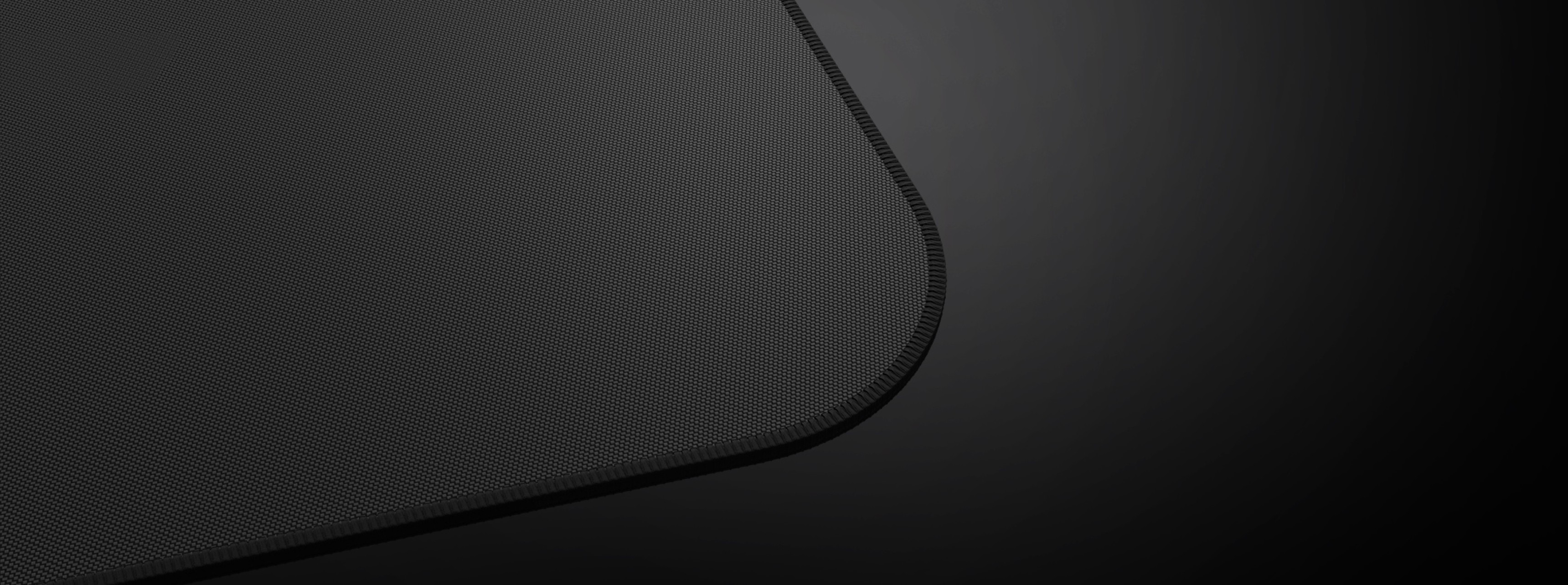 Black mouse pad with a textured surface and rounded corners, featuring the Genesis logo, measuring 400x330mm