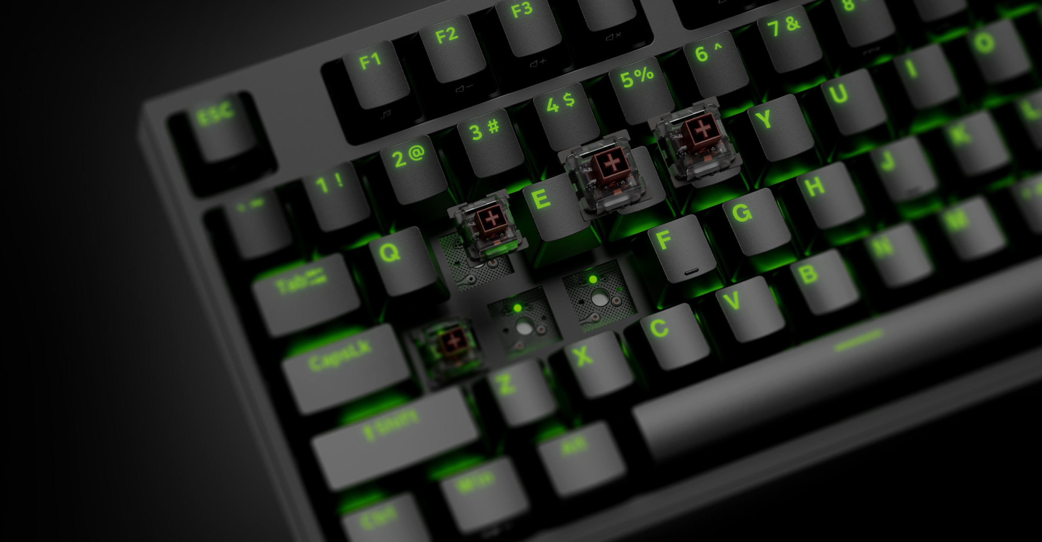 Black mechanical gaming keyboard with Kailh Box Brown switches and RGB backlighting, featuring highlighted keys