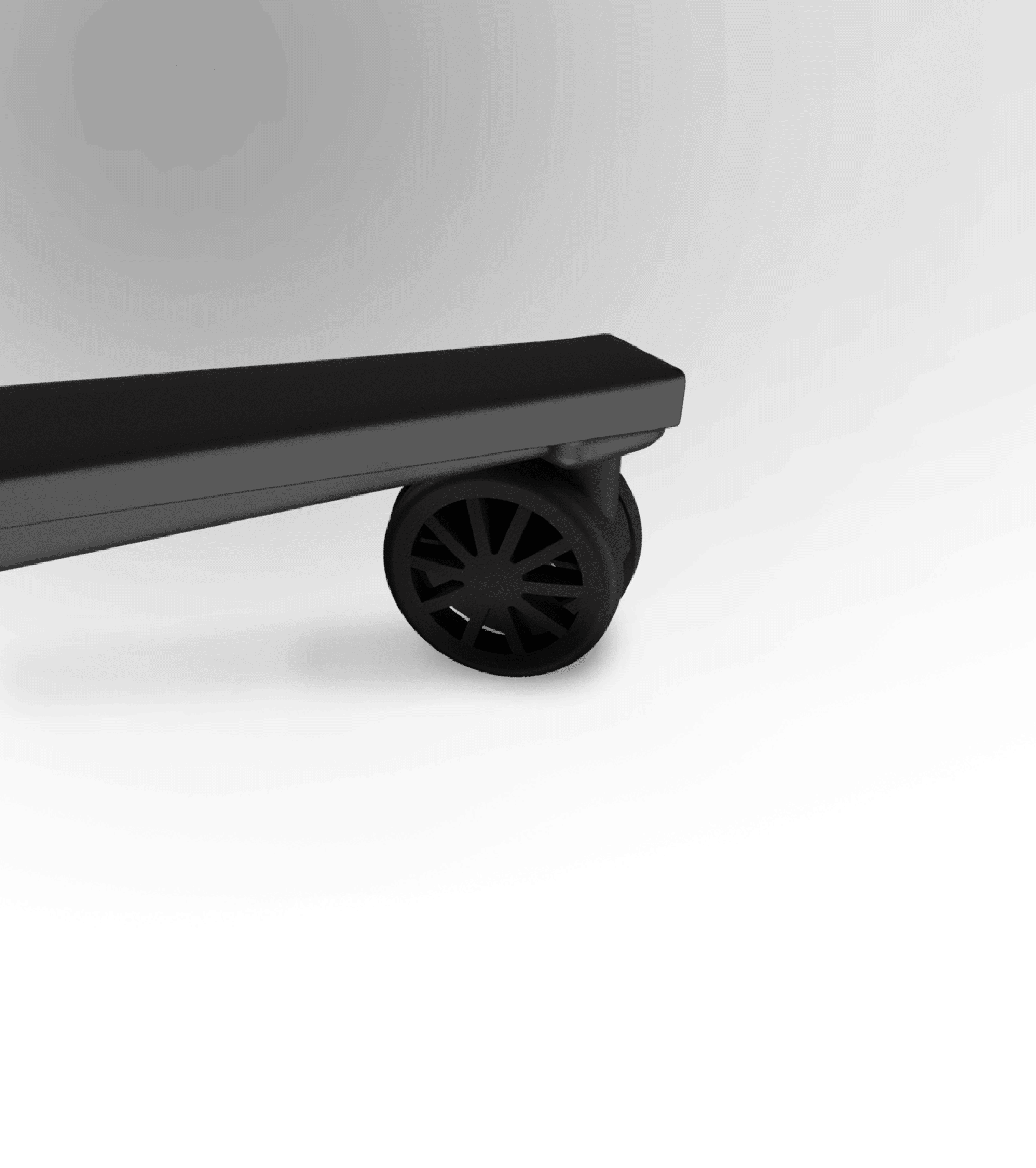 Close-up of a black and gray gaming chair wheelbase, featuring a stylish black wheel design