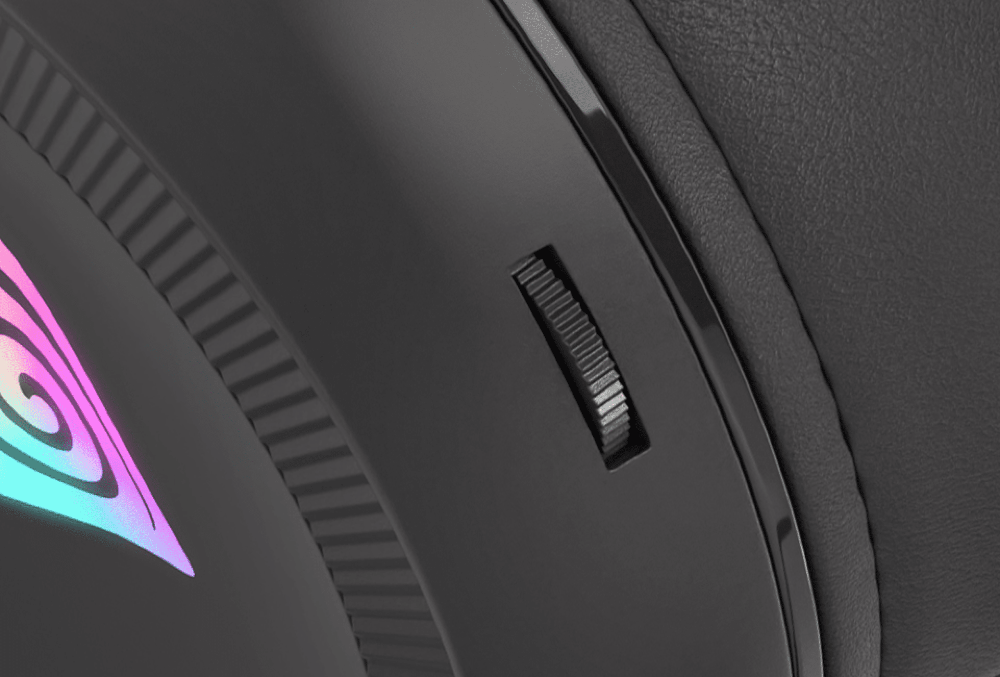 Close-up of a device with a colorful design and a small adjustable control dial.