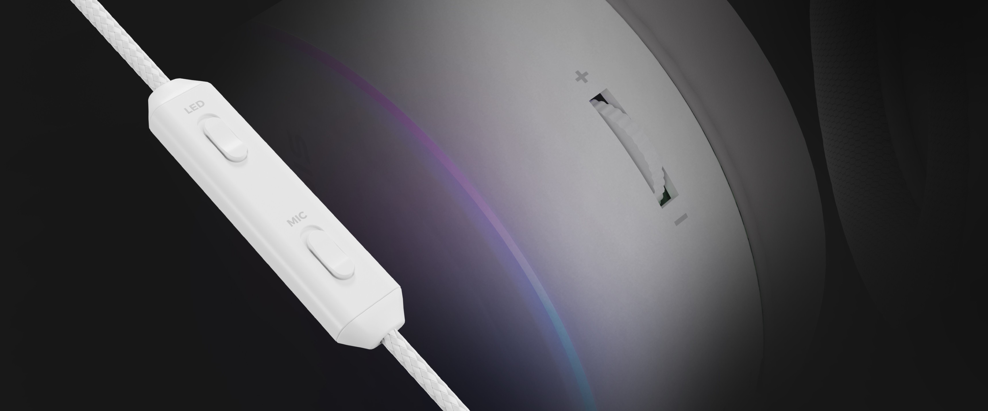 Headphones with a white in-line remote featuring volume control and a sleek design, set against a dark background