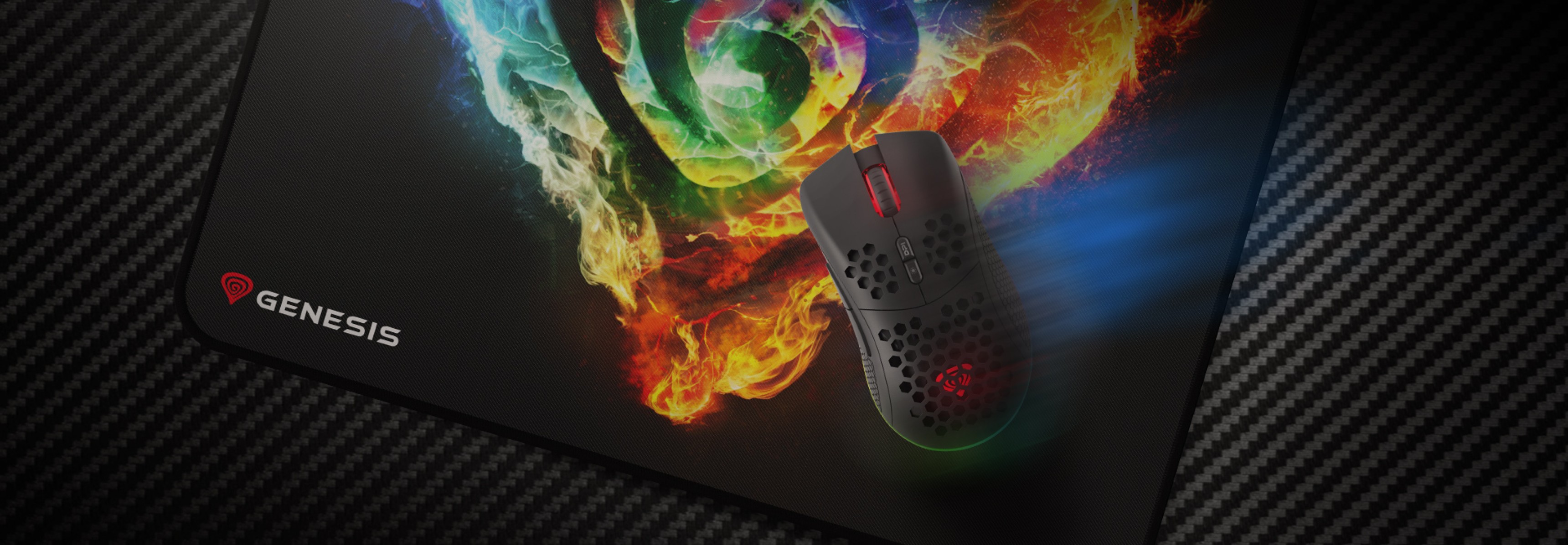 Gaming mouse pad "Genesis Carbon 500 M Fire G2" featuring a colorful swirl design and a gaming mouse on top