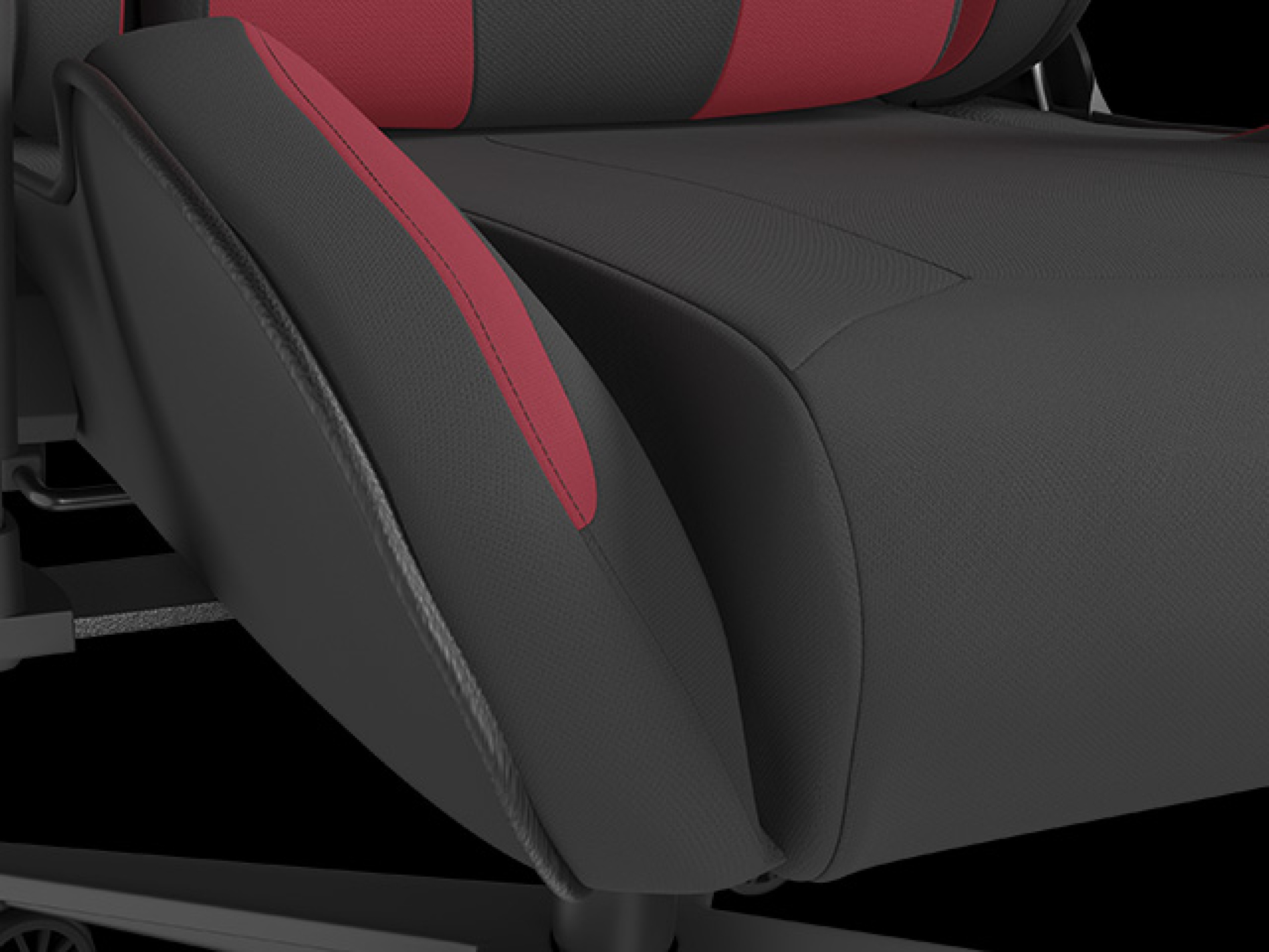 Close-up of the Genesis Nitro 720 gaming chair, featuring a black and pink color scheme with padded armrests