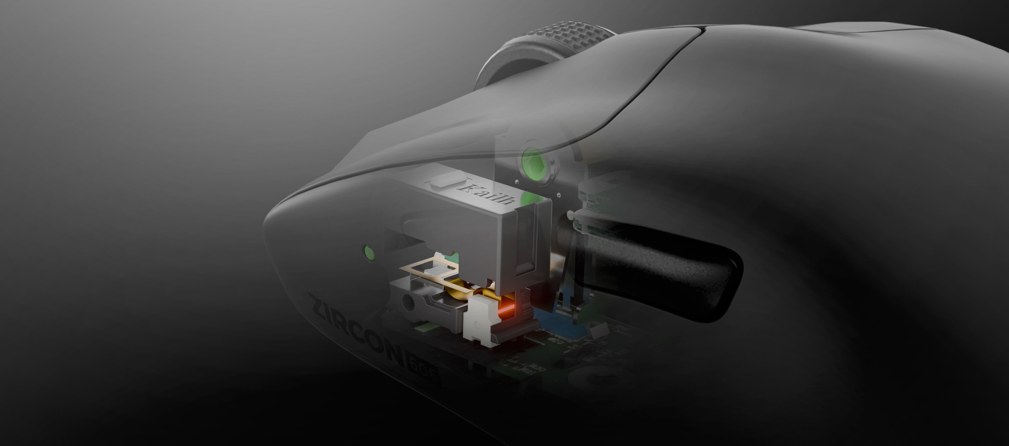 Close-up view of a computer mouse showing internal components and a glowing light.