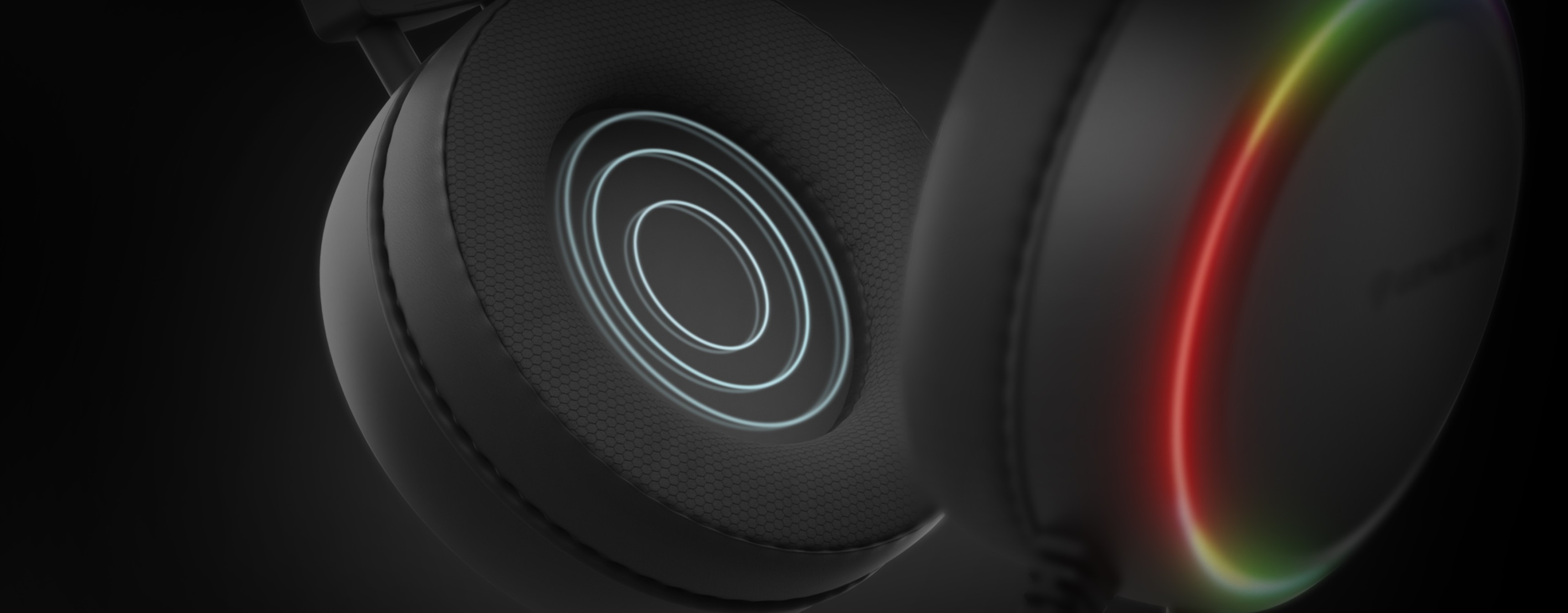 Close-up of black Genesis Neon 613 G2 RGB over-ear headphones featuring glowing accents and a built-in microphone