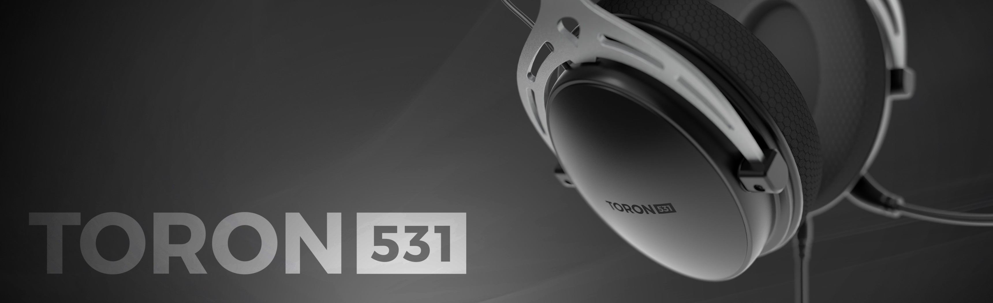 Black Genesis Toron 531 over-ear headphones featuring a microphone, showcasing a sleek design