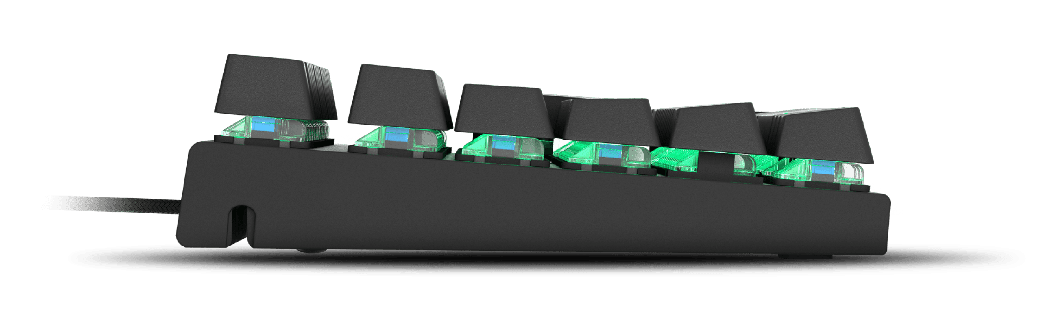 Side view of a keyboard with green backlit keys and a black base.