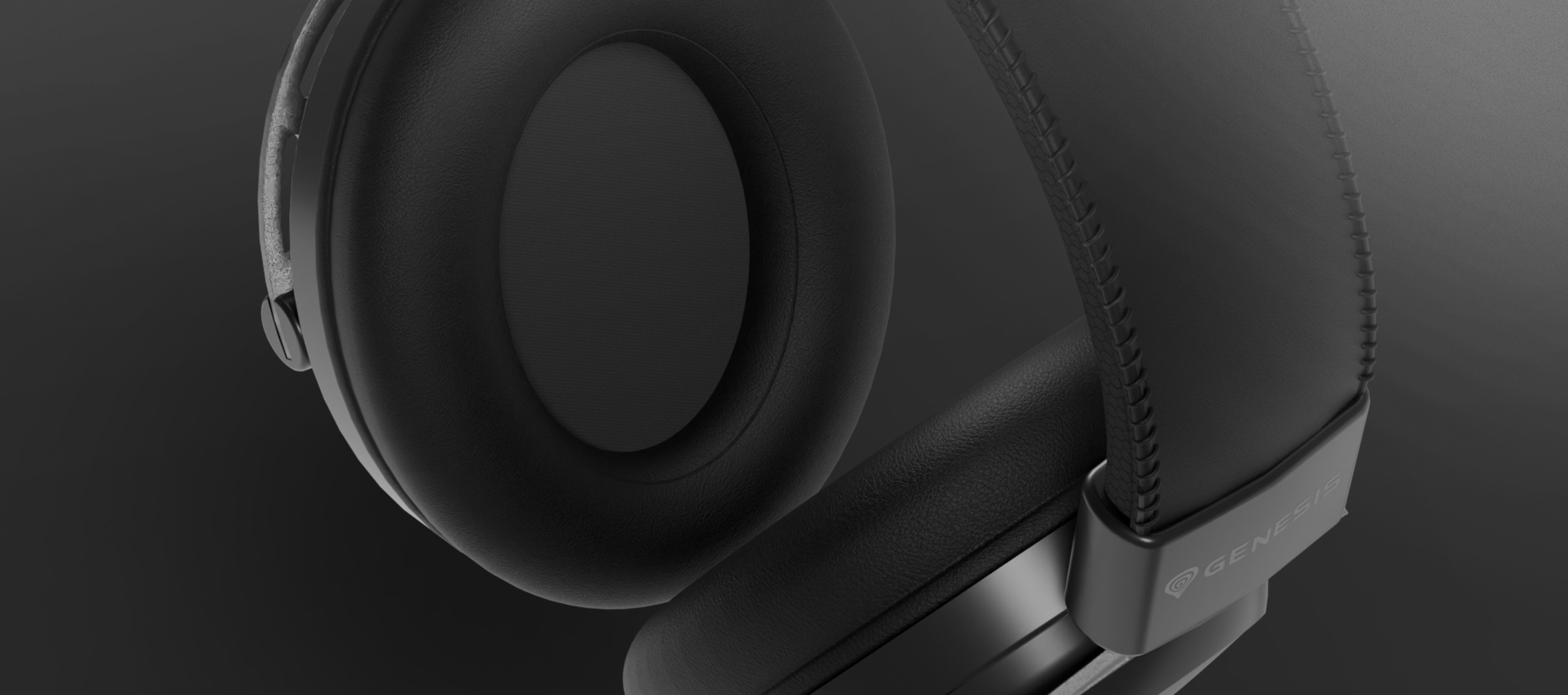 Black over-ear headphones with a microphone, featuring soft cushioned ear cups and a sleek design