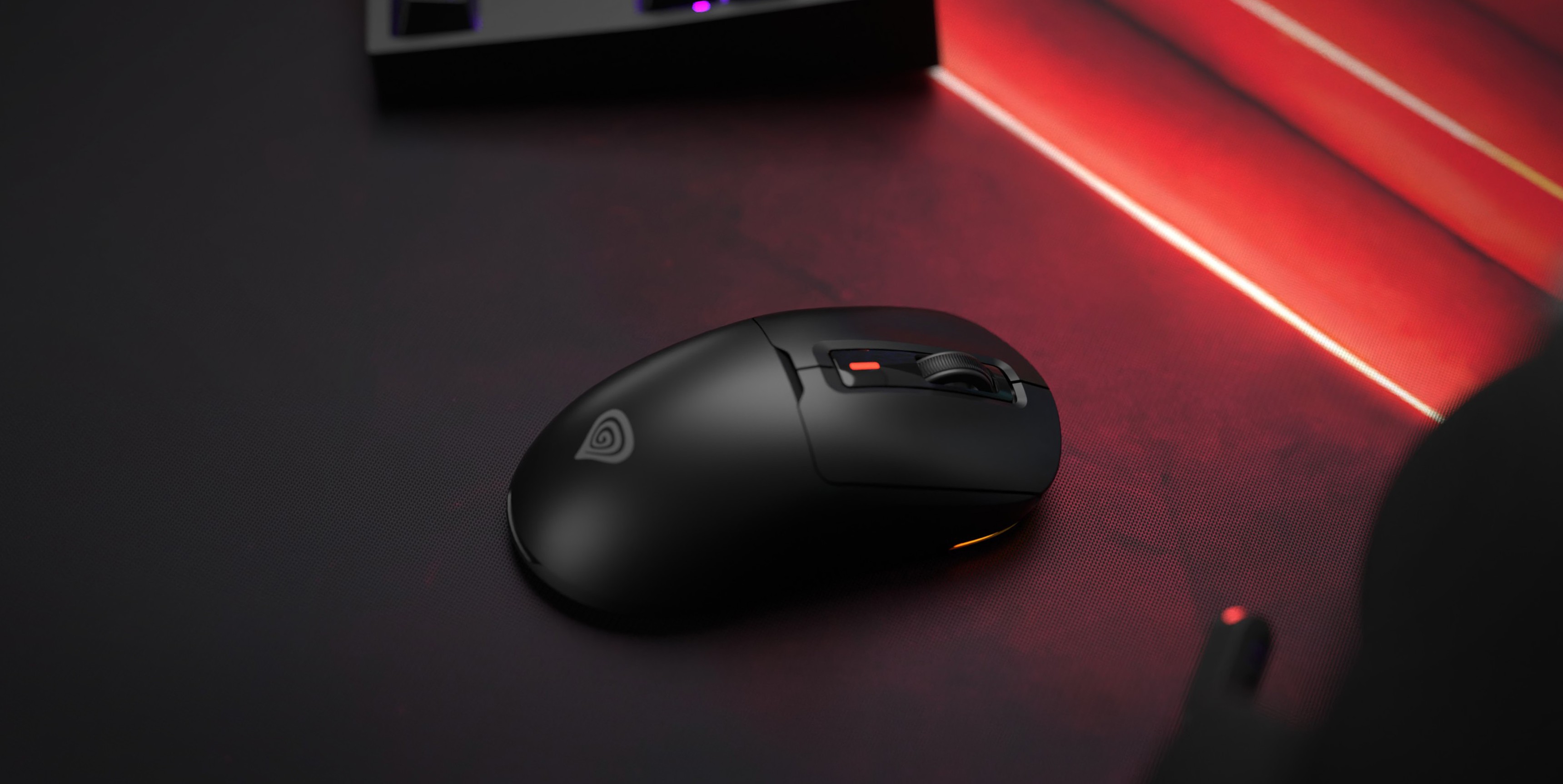 Wireless gaming mouse with a sleek design, featuring customizable buttons and vibrant LED lighting on a dark surface