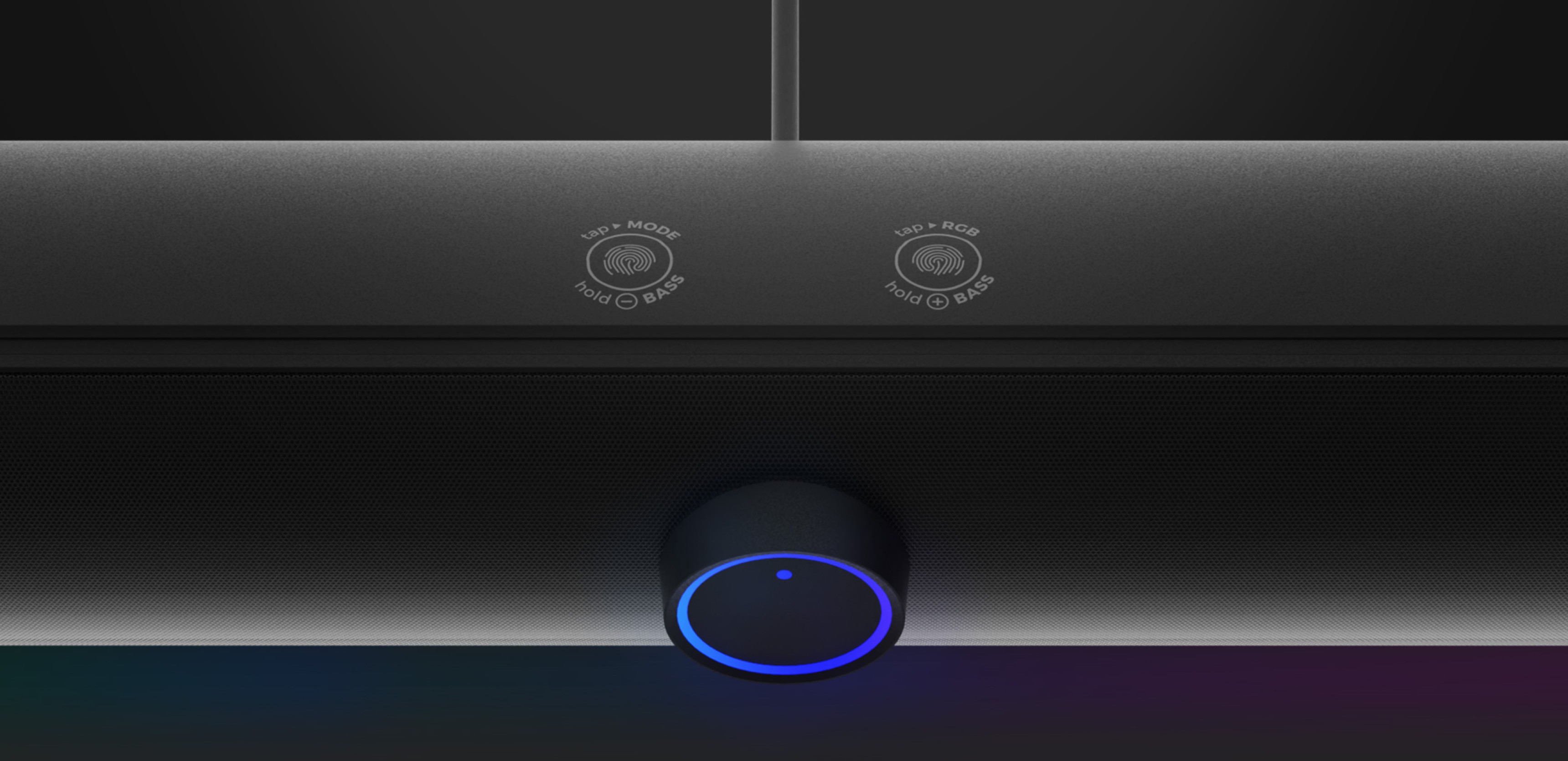 Close-up of the Genesis Helium 312BT soundbar featuring control buttons and a blue LED indicator