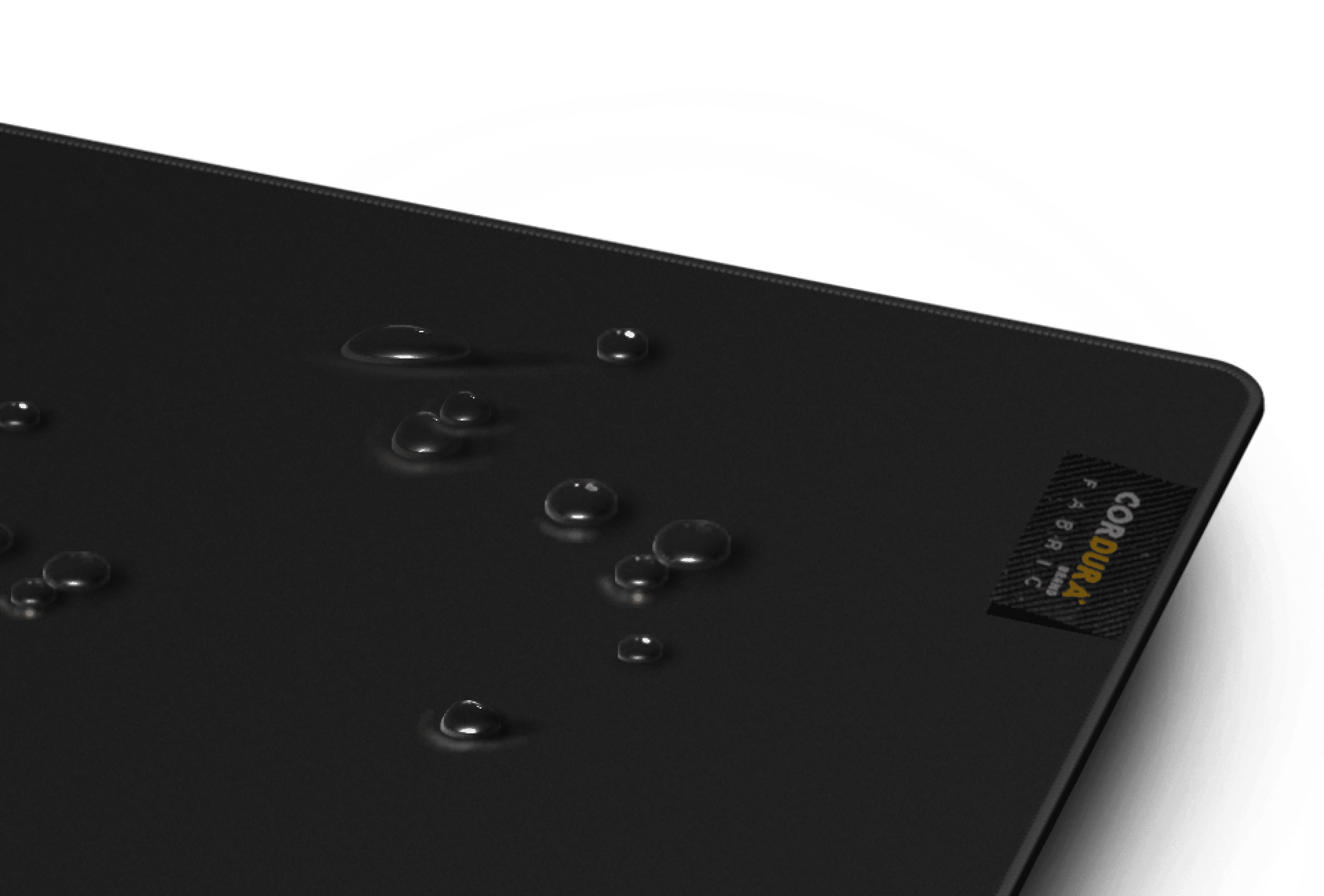 Large black gaming mouse pad with water droplets on the surface and a Cordura label visible in the corner