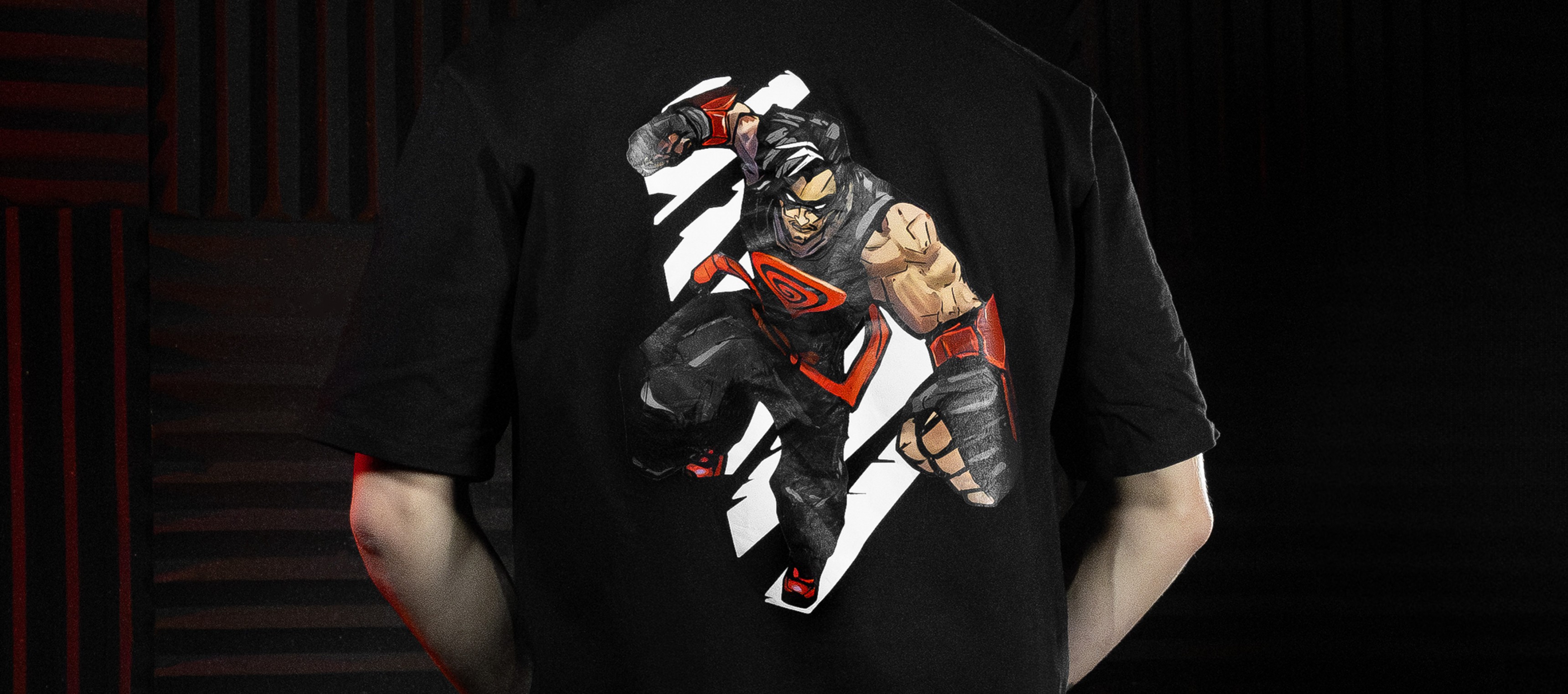 Black t-shirt featuring a colorful graphic of a dynamic character in action.
