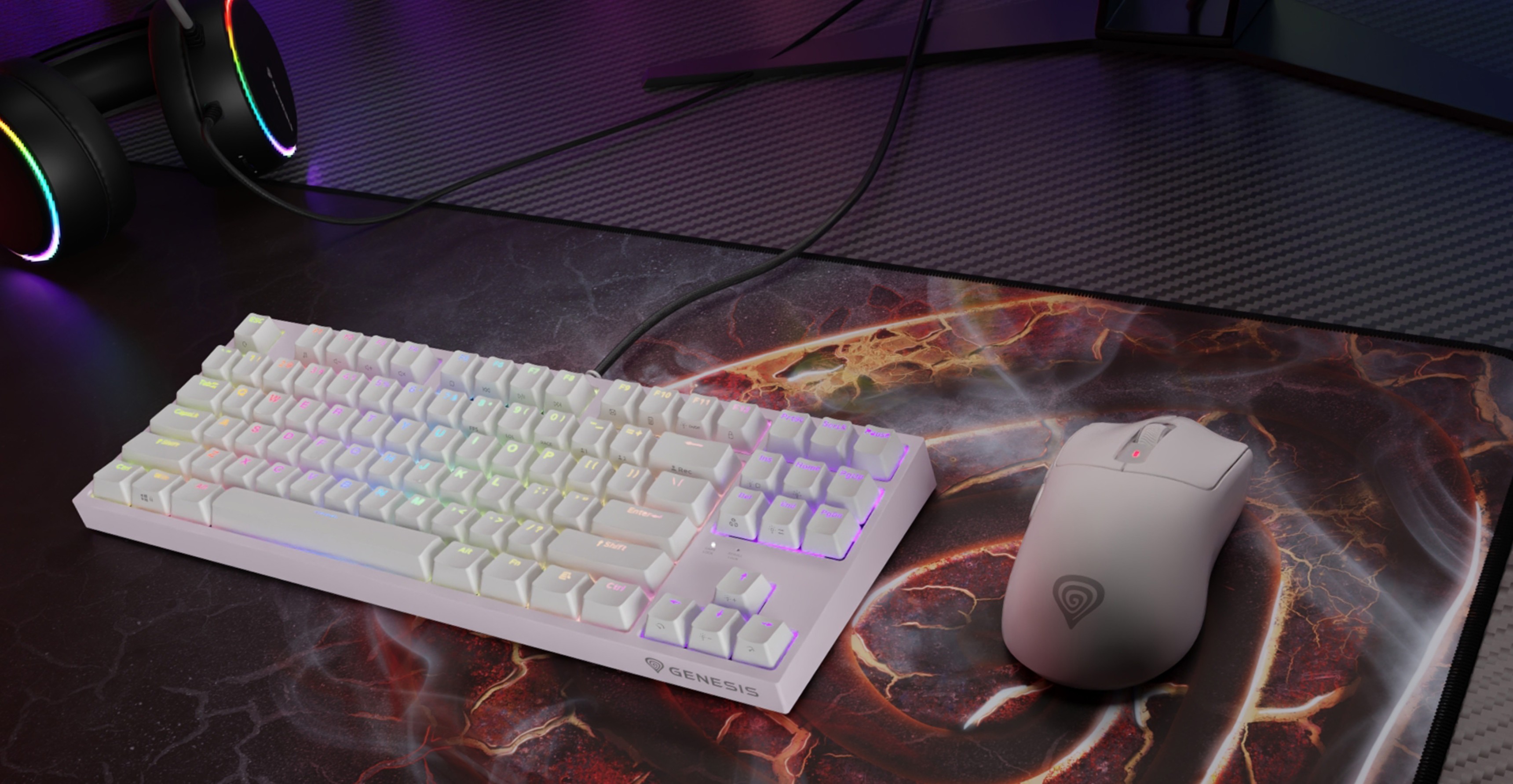 White keyboard with colorful backlighting next to a white gaming mouse on a dark mat.