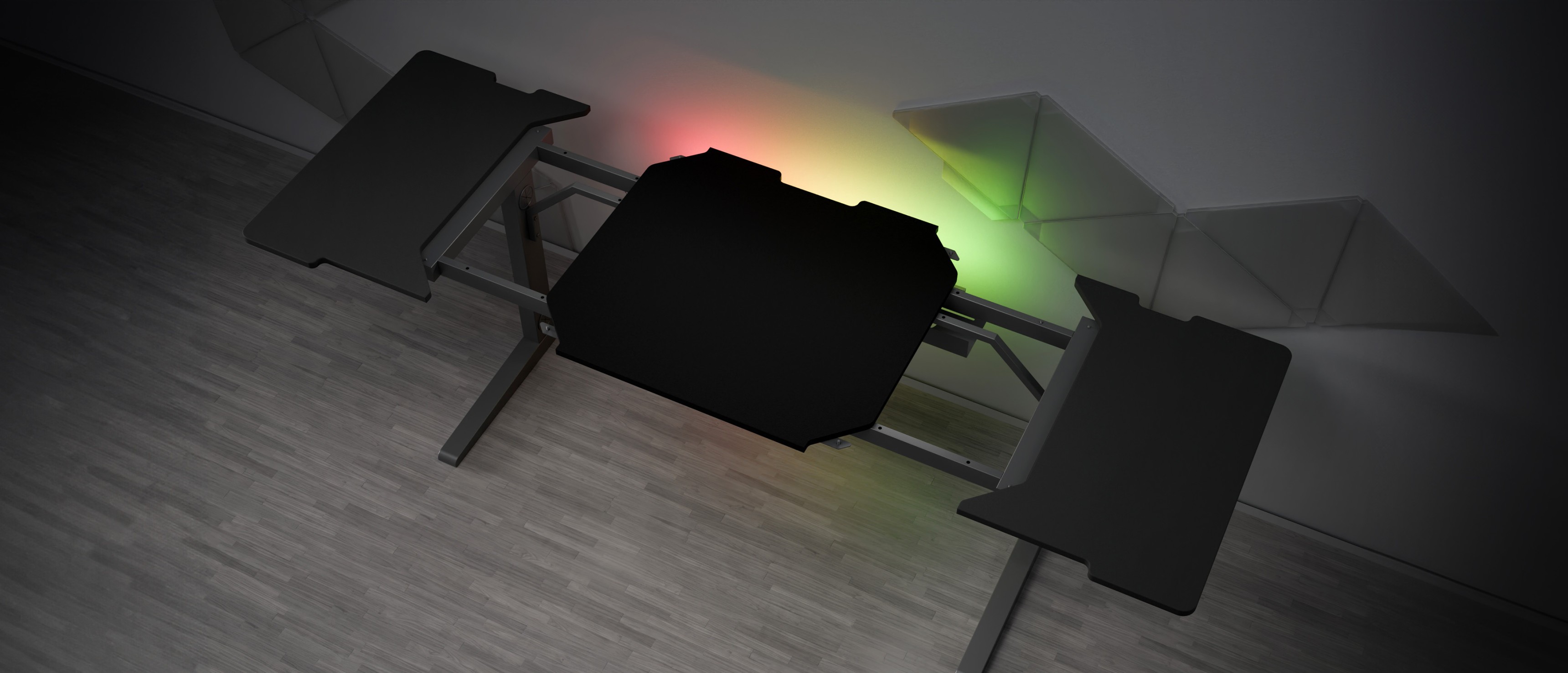 Modular Genesis Holm gaming desk with a sleek black surface and RGB lighting accents on the sides