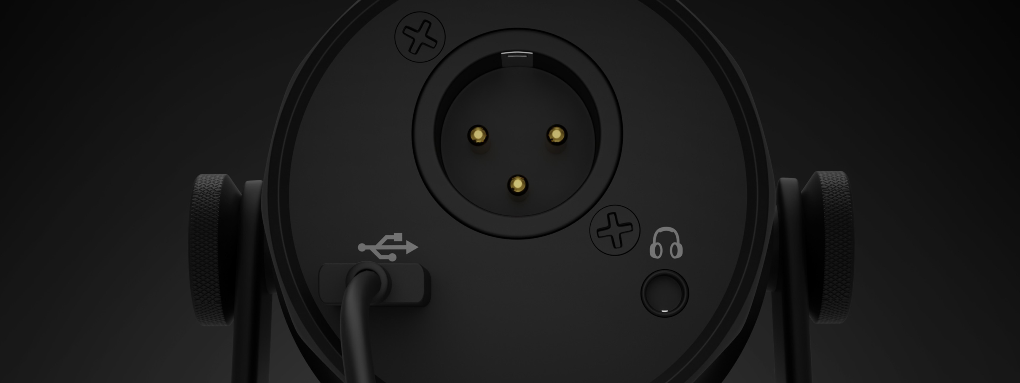 Microphone back view with connection ports for audio and a headphone jack