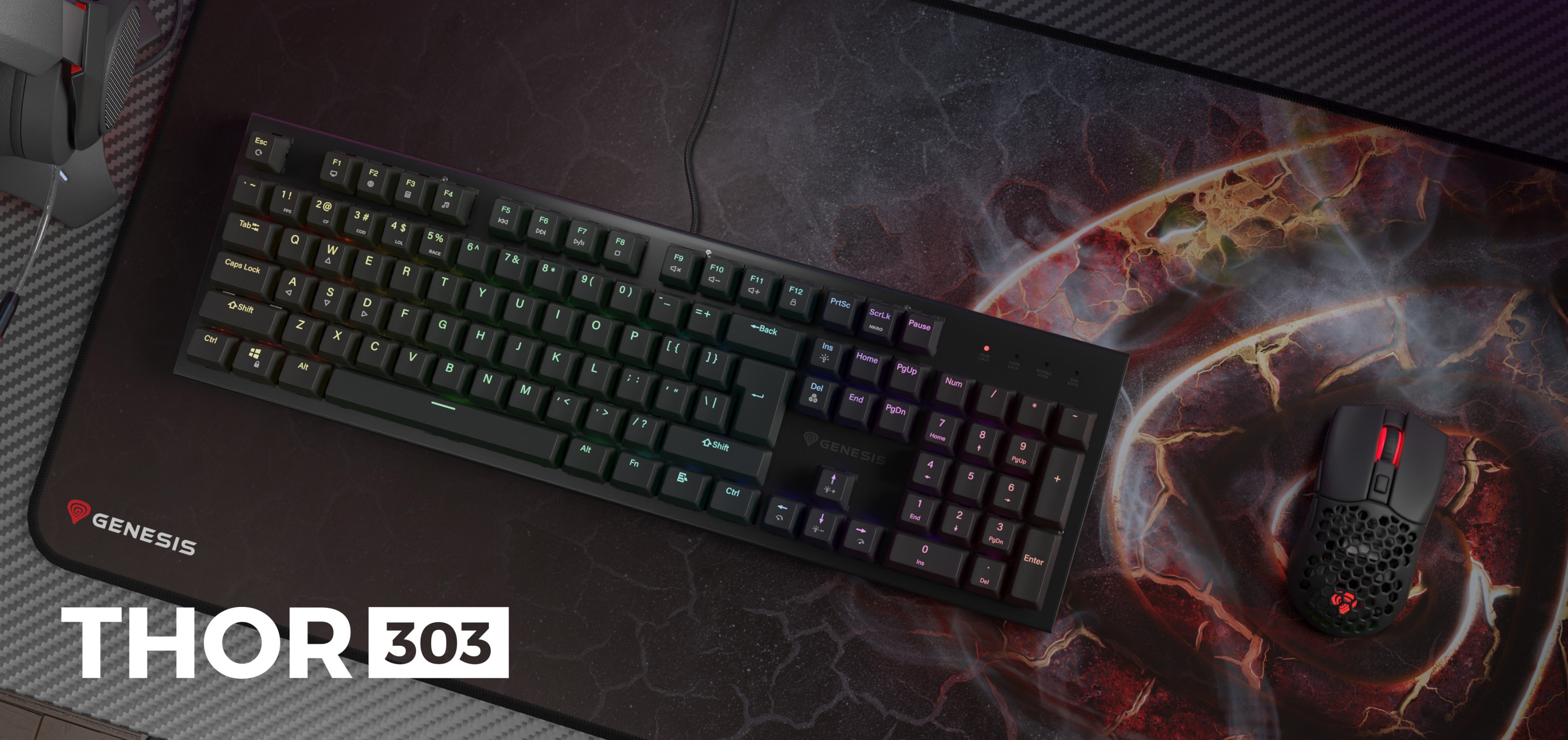Black Genesis Thor 303 gaming keyboard features RGB backlighting and red mechanical switches, placed on a stylish mousepad