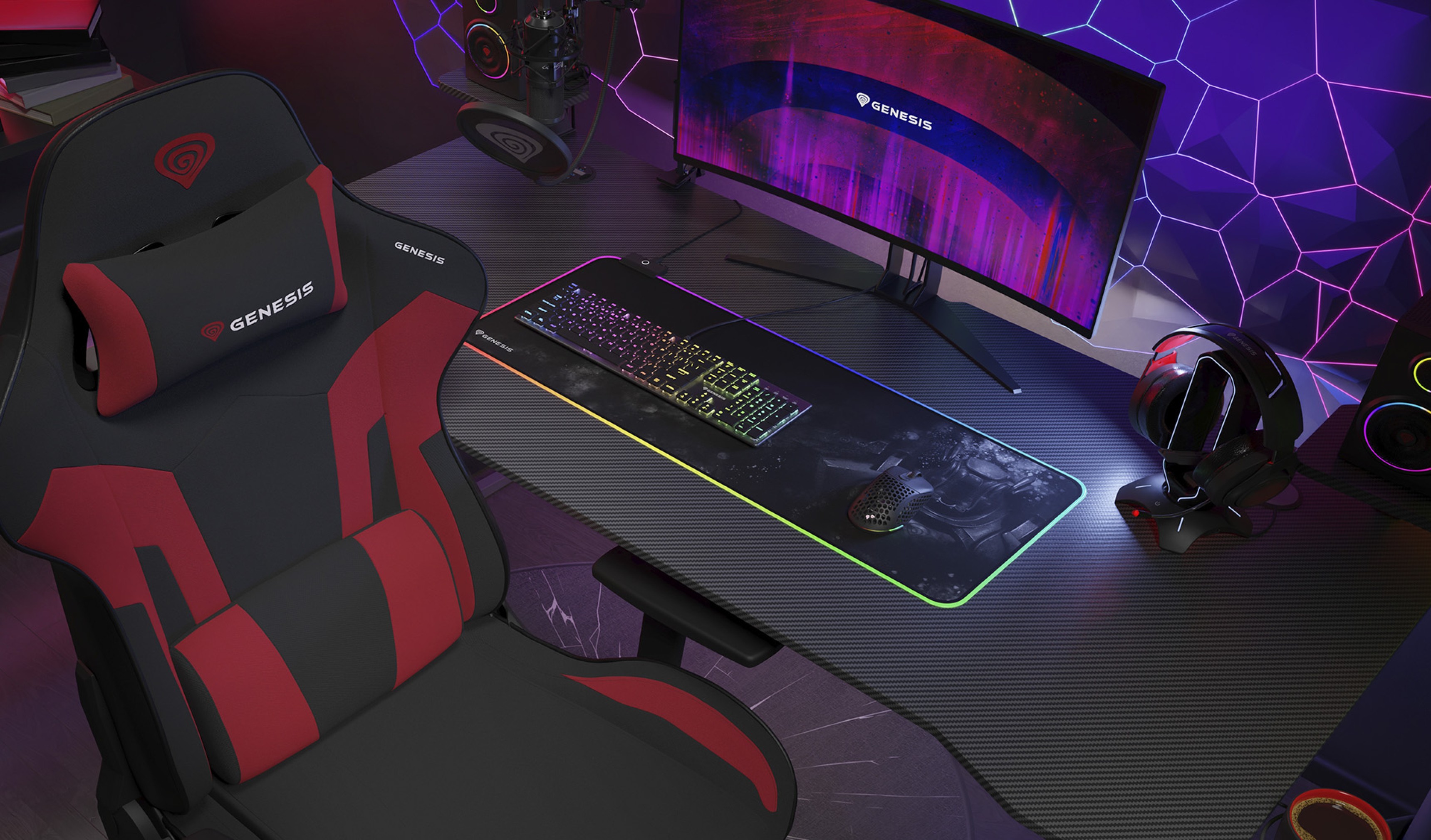 Black and red gaming chair with ergonomic design, set on a gaming desk featuring a monitor, keyboard, mouse pad, and headphones