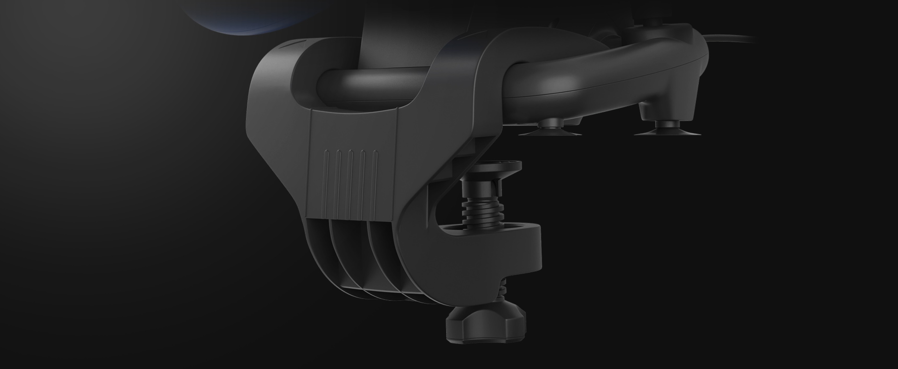 Black racing wheel clamp with adjustable mounts for secure attachment to a surface. Suitable for multiple gaming consoles