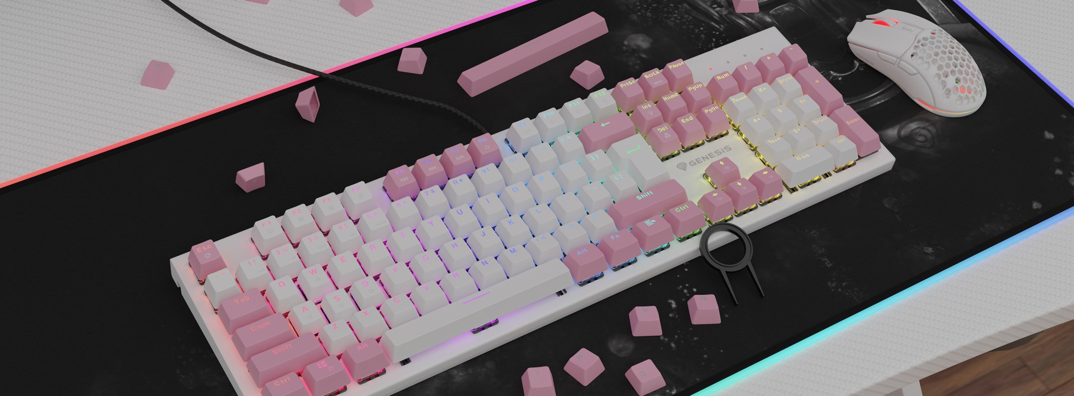 Pink double shot keycaps arranged on a mechanical keyboard with RGB lighting, accompanied by a white mouse and scattered pink keycaps
