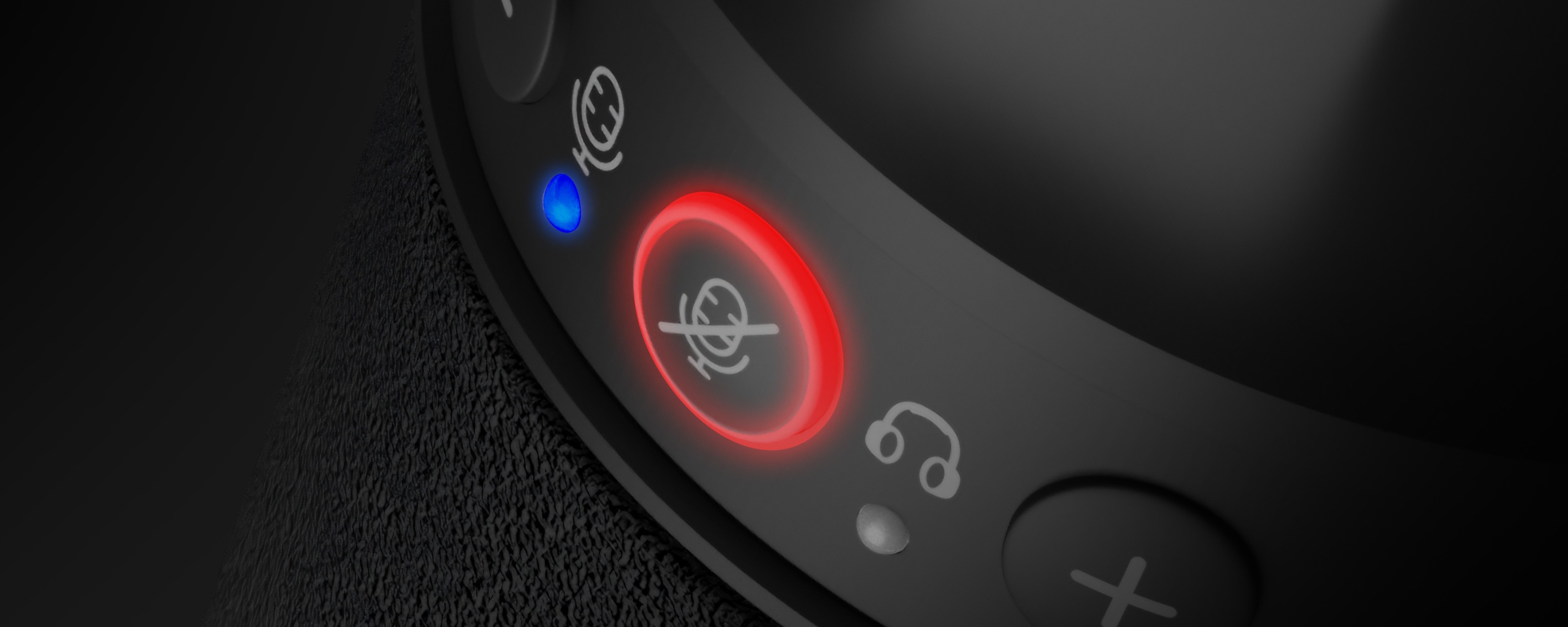 Control panel of a microphone with various knobs and illuminated indicators