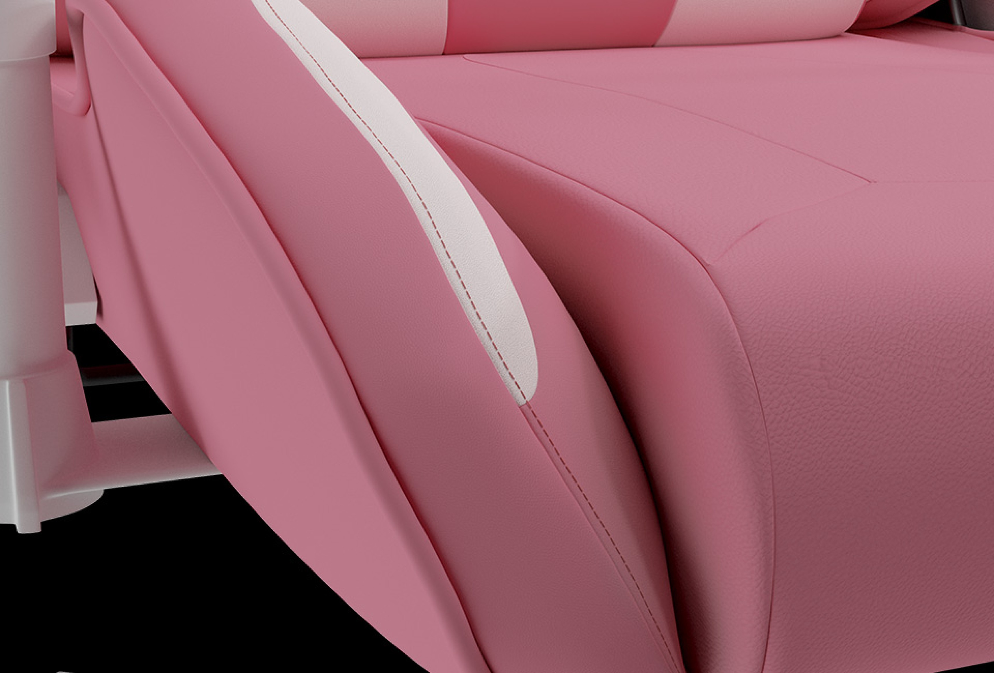 Close-up of the Genesis Nitro 710 gaming chair in pink and white, featuring smooth, textured upholstery