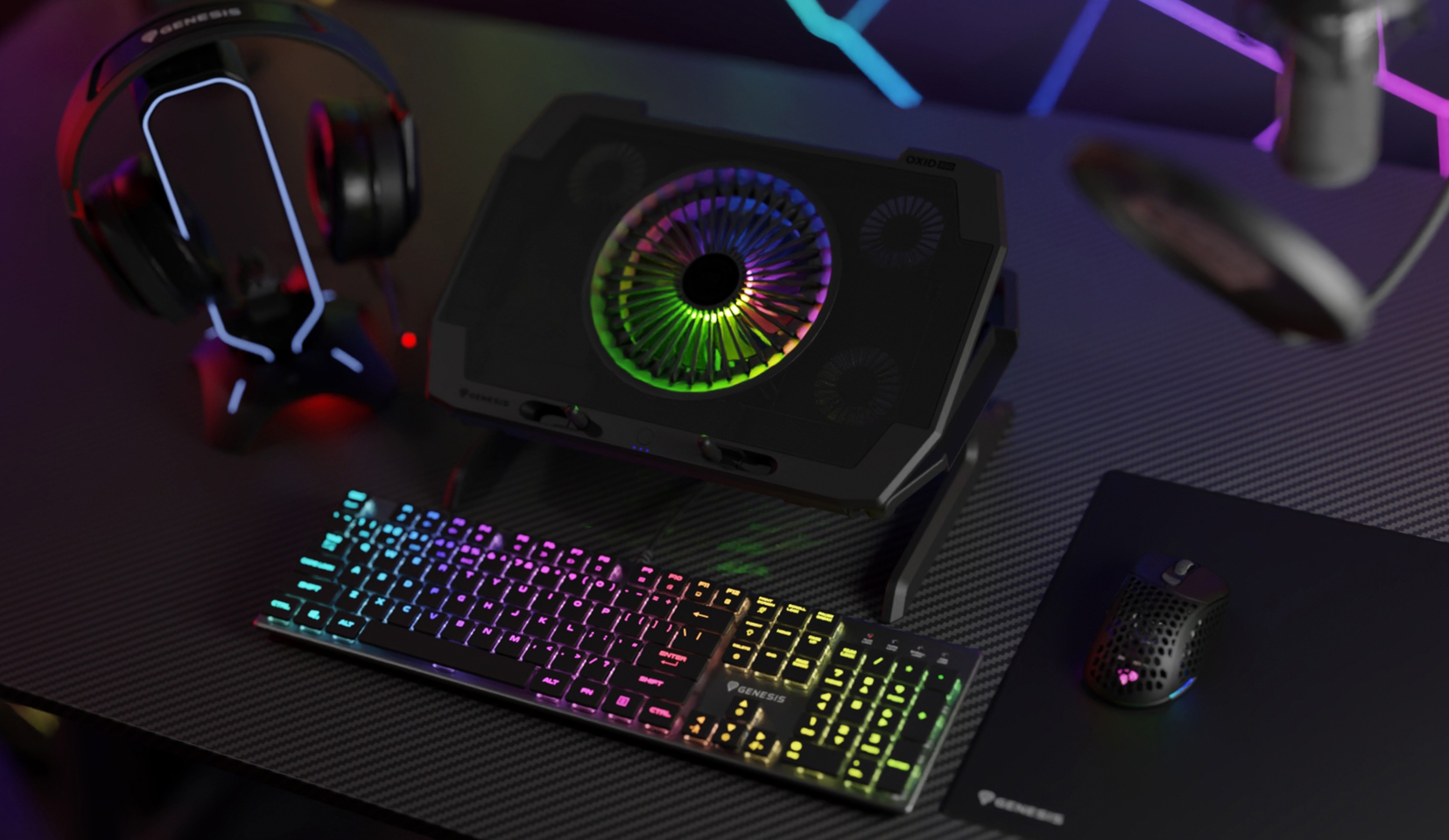Cooling pad for laptops with five fans, RGB lighting, and designed for laptop sizes 15.6" to 17.3". Features a keyboard and mouse