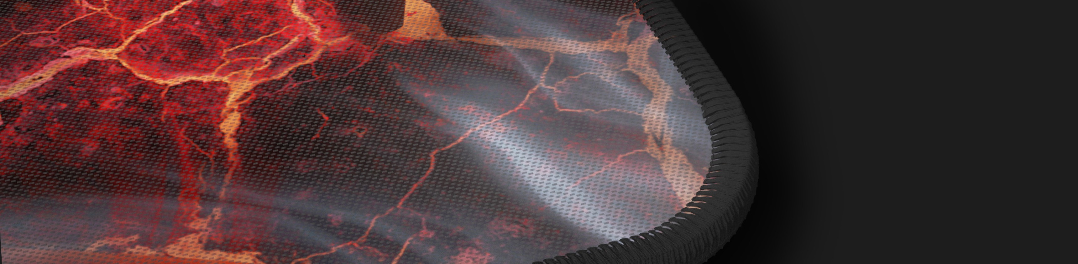 Gaming mouse pad with a lava-inspired design, featuring a textured surface and black edges, measuring 900x450mm