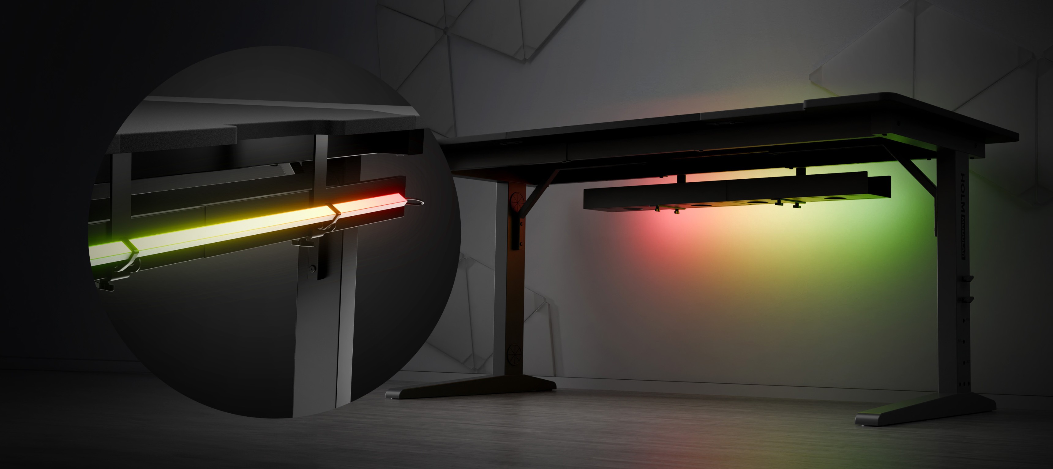 Modular Genesis Holm 160 gaming desk featuring adjustable height and RGB lighting under the tabletop