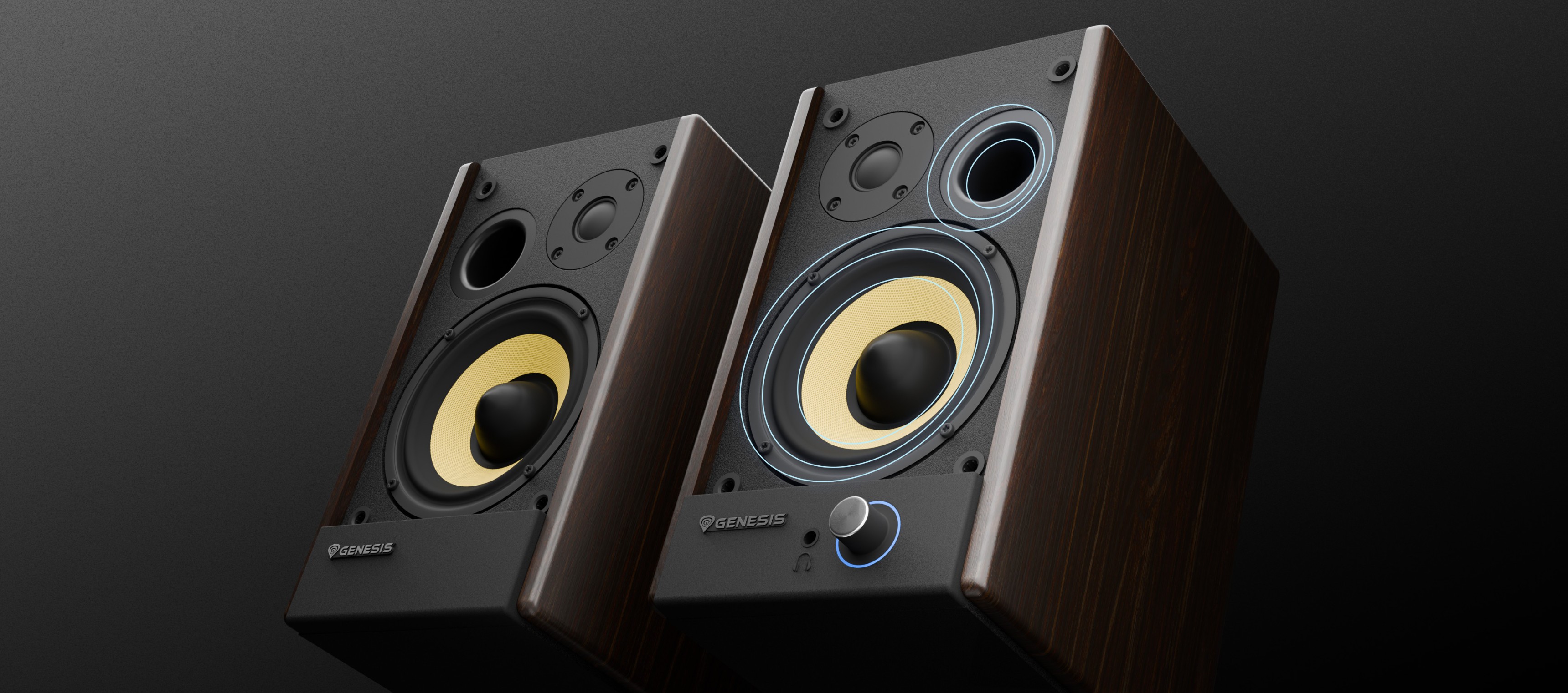 Wooden speakers with multiple sound drivers and a volume control knob on the front.