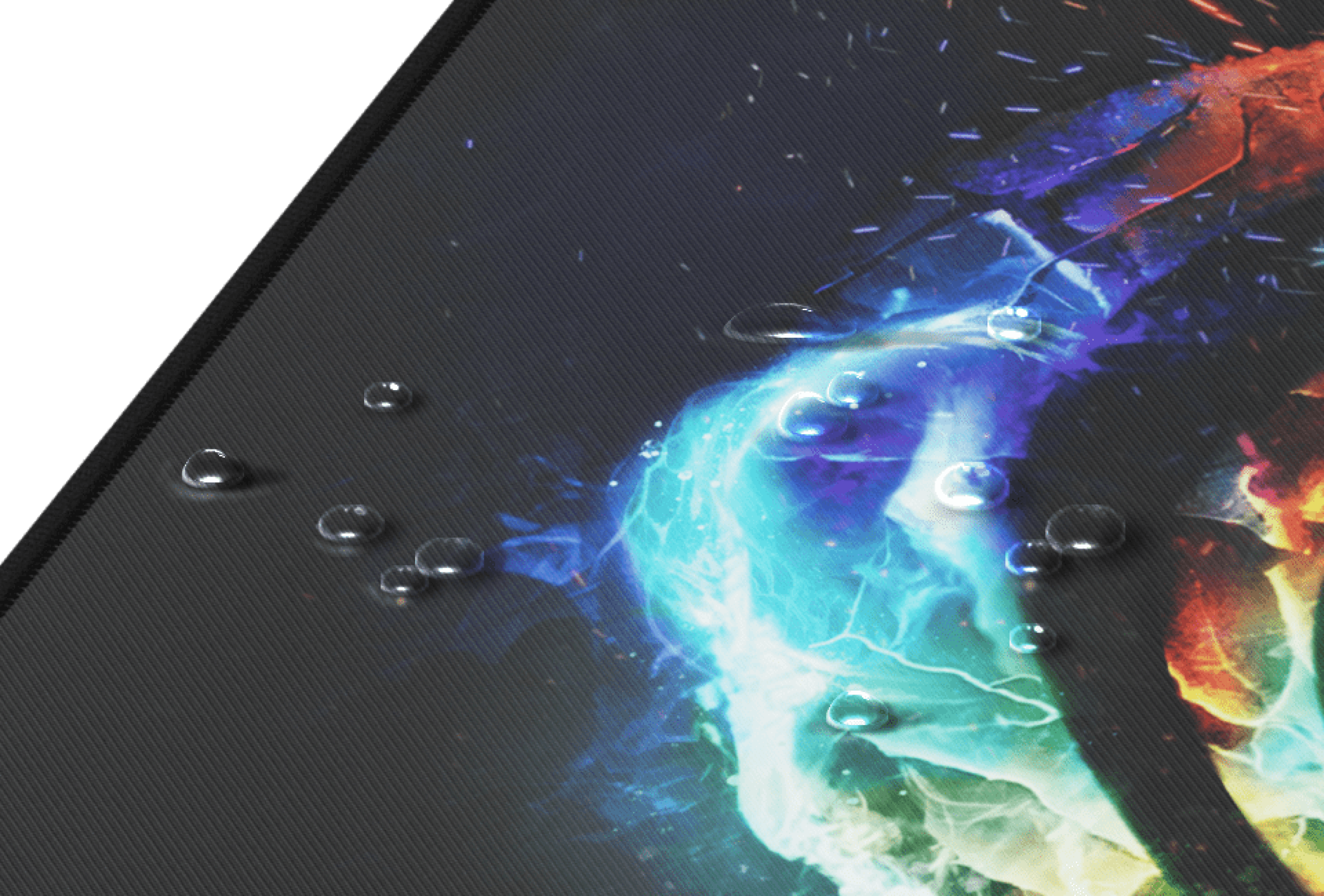 Close-up of the Genesis Carbon 500 M Fire mouse pad showing a vibrant design with water droplets on the surface