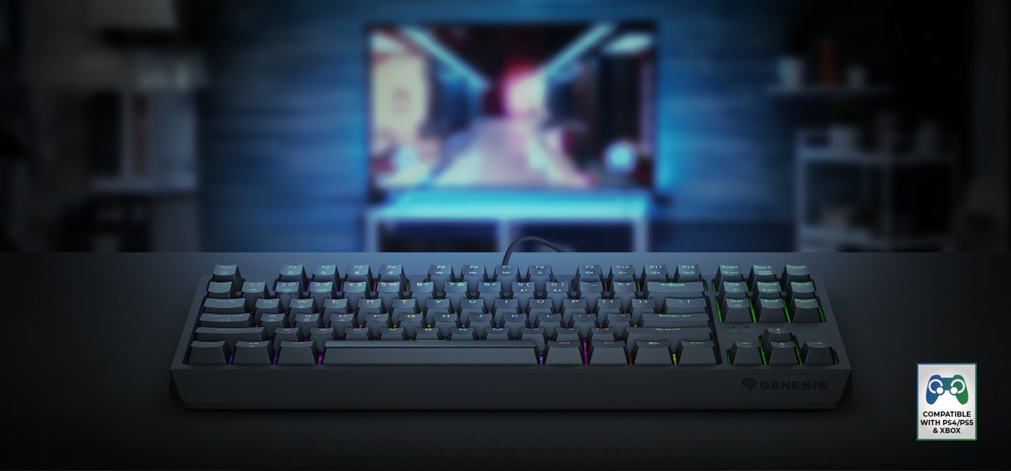 Mechanical gaming keyboard with RGB backlighting, hot-swappable switches, positioned in front of a blurred television screen