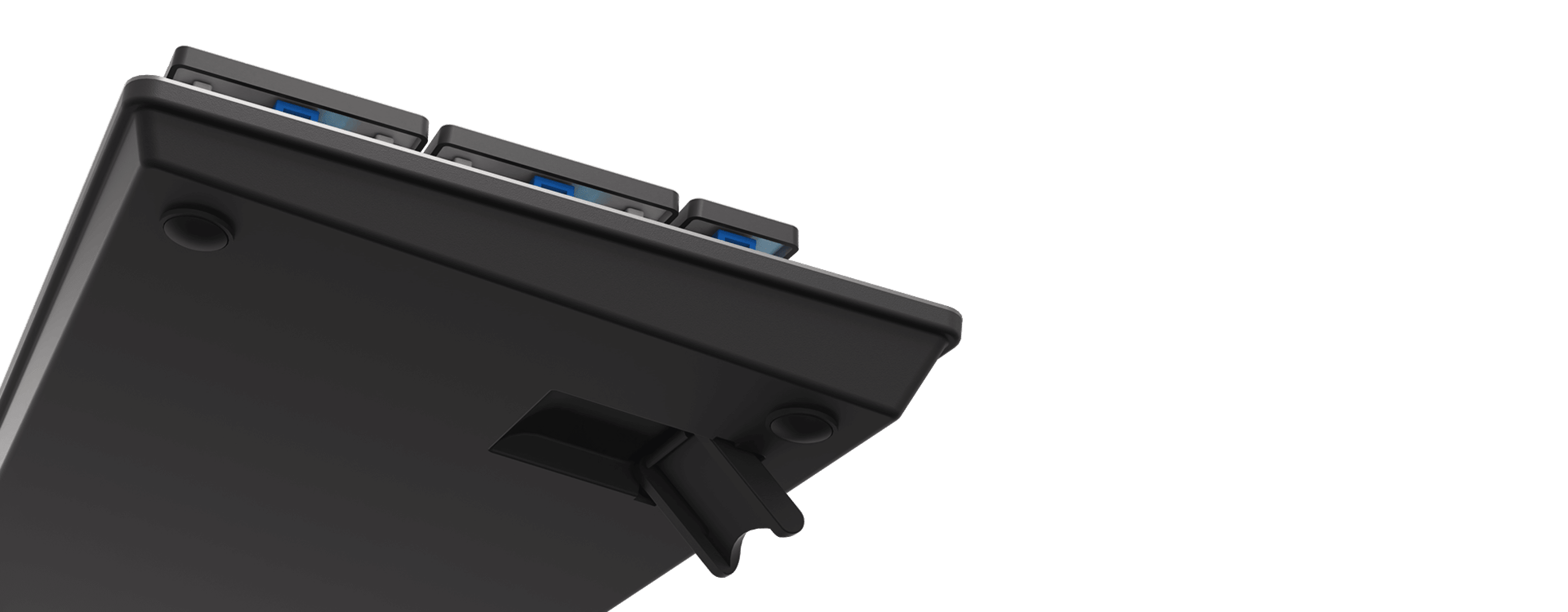 Close-up of the Genesis Thor 420 RGB gaming keyboard showing USB ports and an adjustable stand