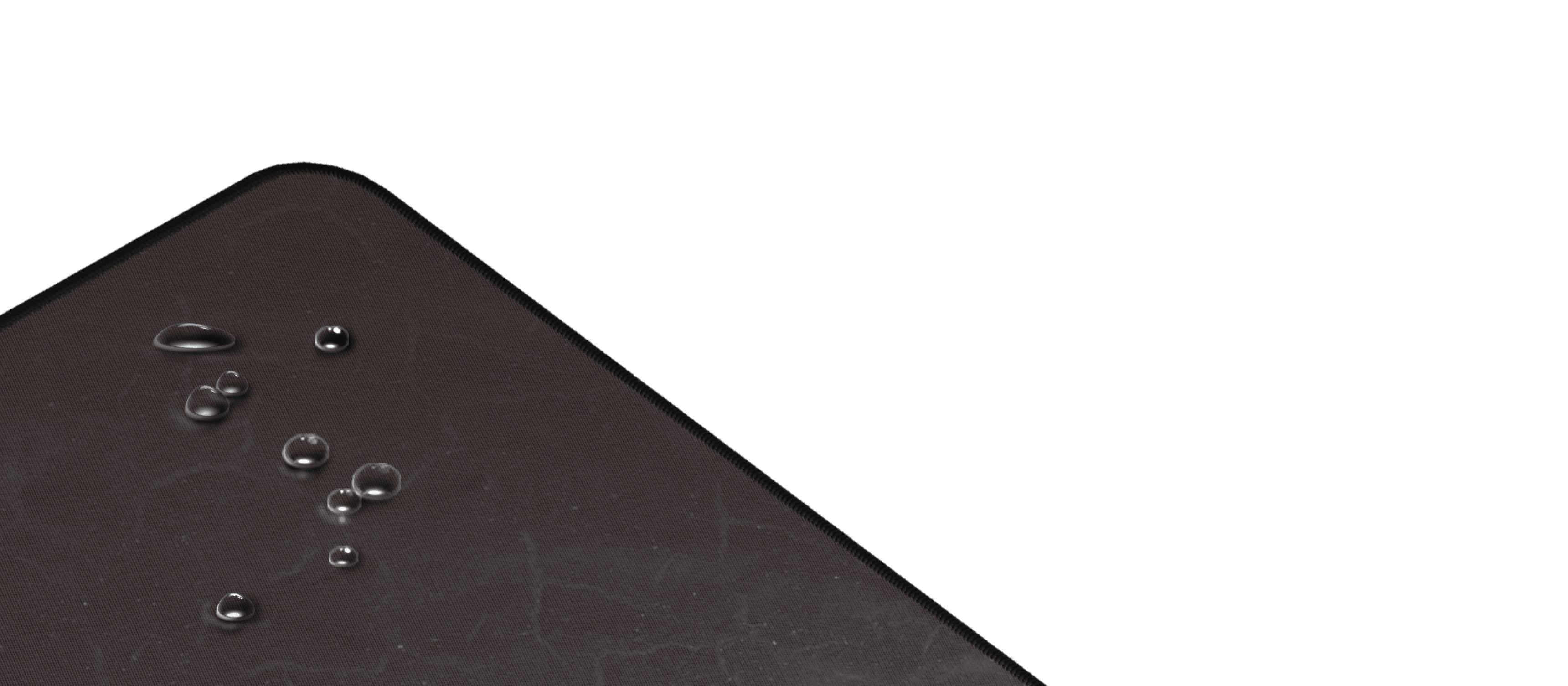 Large black gaming mouse pad with a textured surface and water droplets on one corner