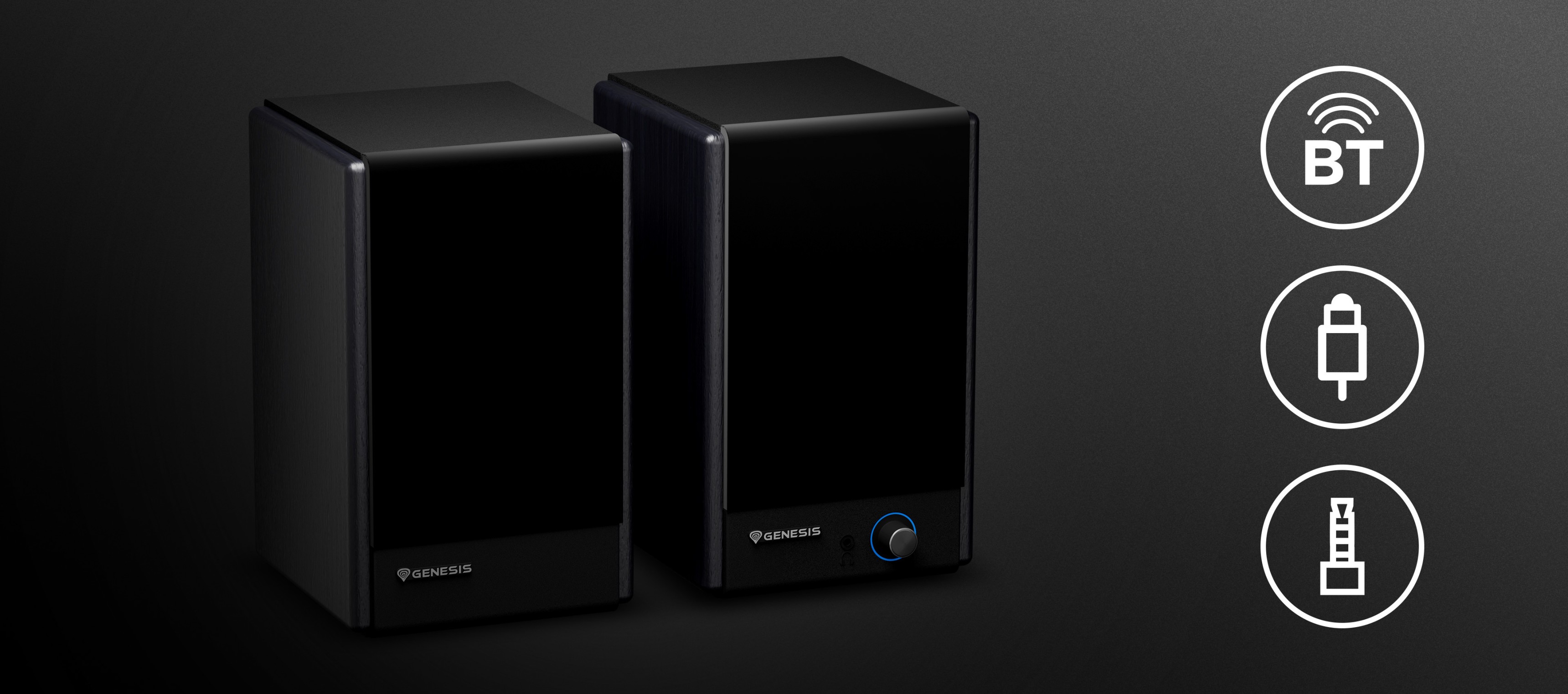 Two black speakers with a glossy finish and a volume knob on one unit.